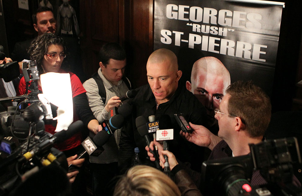 UFC Welterweight Champion Georges St-Pierre answers questions from the media at the UFC 124 open workouts at the Marriott Chateau Champlain in on December 8, 2010 in Montreal, Quebec, Canada.