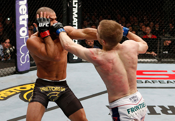 LONDON, ENGLAND - FEBRUARY 16: (R-L) Michael McDonald and Renan Barao trade punches in their interim bantamweight title fight during the UFC on Fuel TV event on February 16, 2013 at Wembley Arena in London, England. (Photo by Josh Hedges/Zuffa LLC/Zuffa LLC via Getty Images)