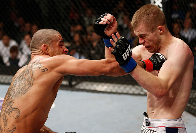 LONDON, ENGLAND - FEBRUARY 16: (L-R) Renan Barao punches Michael McDonald in their interim bantamweight title fight during the UFC on Fuel TV event on February 16, 2013 at Wembley Arena in London, England. (Photo by Josh Hedges/Zuffa LLC/Zuffa LLC via Getty Images)