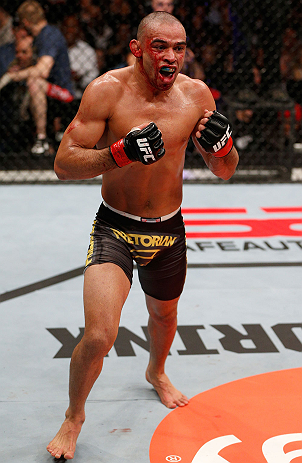 LONDON, ENGLAND - FEBRUARY 16: Renan Barao reacts after defeating Michael McDonald in their interim bantamweight title fight during the UFC on Fuel TV event on February 16, 2013 at Wembley Arena in London, England. (Photo by Josh Hedges/Zuffa LLC/Zuffa LLC via Getty Images)