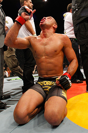 LONDON, ENGLAND - FEBRUARY 16: Renan Barao reacts after defeating Michael McDonald in their interim bantamweight title fight during the UFC on Fuel TV event on February 16, 2013 at Wembley Arena in London, England. (Photo by Josh Hedges/Zuffa LLC/Zuffa LLC via Getty Images)