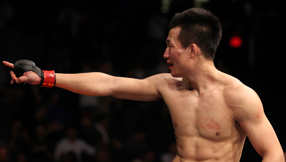 FAIRFAX, VA - MAY 15:  "The Korean Zombie" Chan Sung Jung reacts after defeating Dustin Poirier in a featherweight bout during the UFC on Fuel TV event at Patriot Center on May 15, 2012 in Fairfax, Virginia.  (Photo by Josh Hedges/Zuffa LLC/Zuffa LLC via Getty Images)