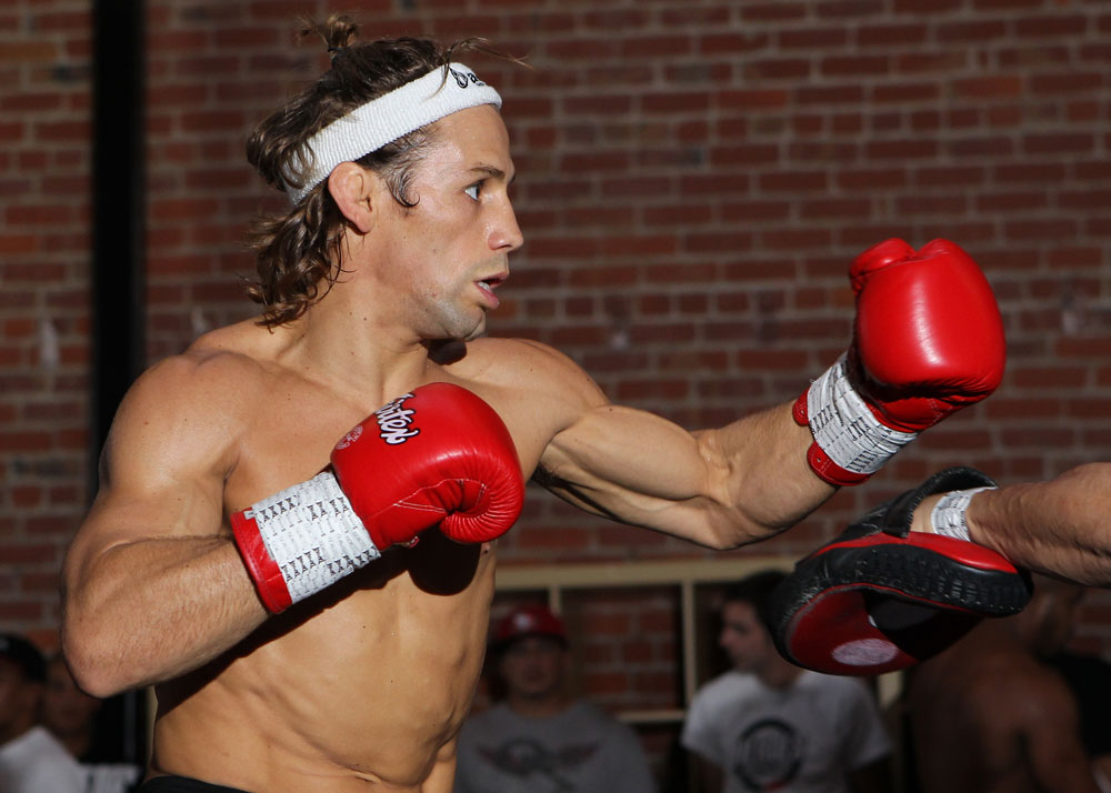 SAN JOSE, CA - NOVEMBER 16:  Urijah Faber works out for the fans and media during the UFC 139 open workouts at the Heroes Martial Arts Gym on November 16, 2011 in San Jose, California.  (Photo by Josh Hedges/Zuffa LLC/Zuffa LLC via Getty Images)
