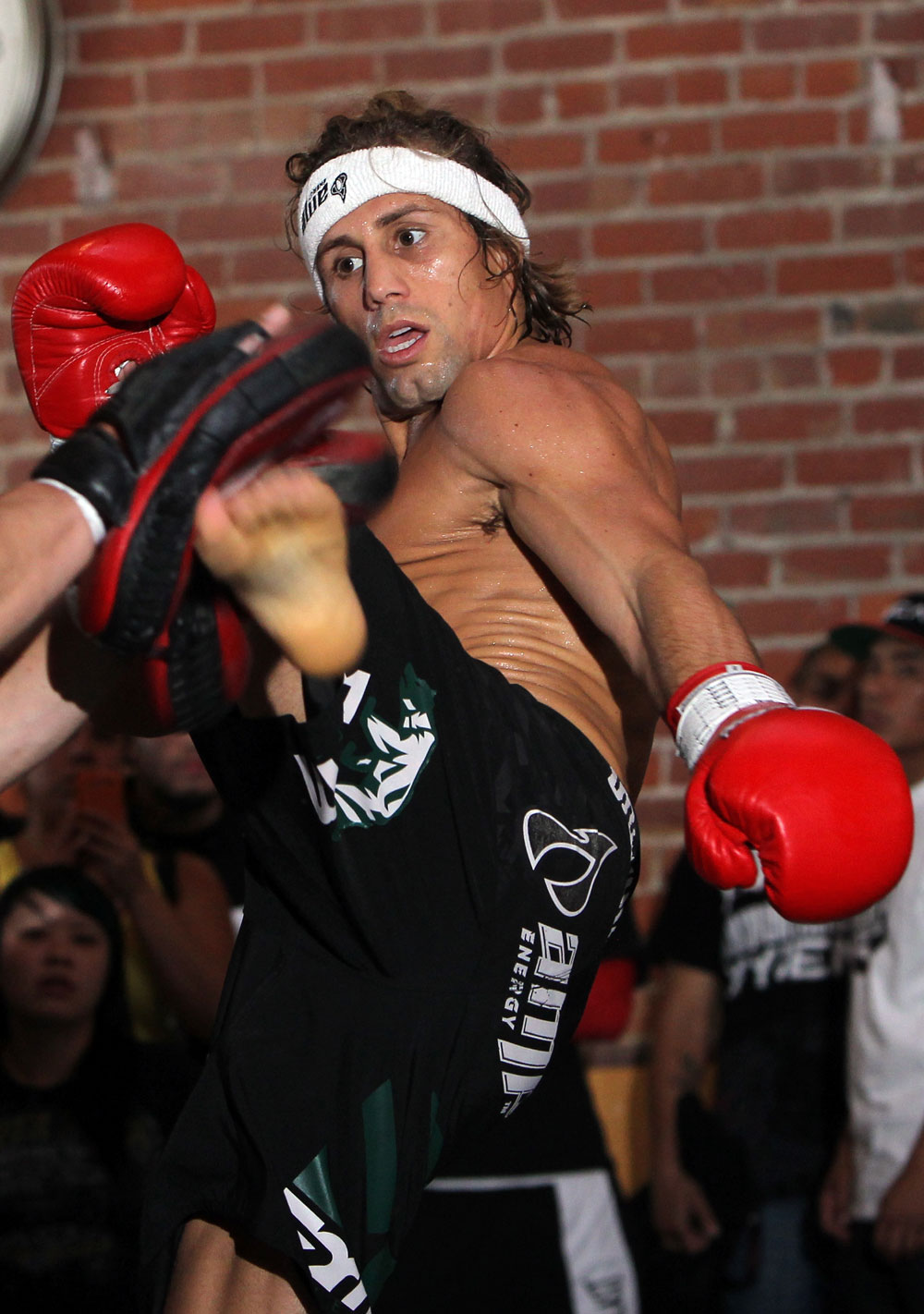 SAN JOSE, CA - NOVEMBER 16:  Urijah Faber works out for the fans and media during the UFC 139 open workouts at the Heroes Martial Arts Gym on November 16, 2011 in San Jose, California.  (Photo by Josh Hedges/Zuffa LLC/Zuffa LLC via Getty Images)