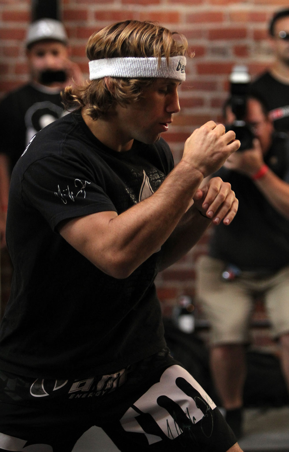 SAN JOSE, CA - NOVEMBER 16:  Urijah Faber works out for the fans and media during the UFC 139 open workouts at the Heroes Martial Arts Gym on November 16, 2011 in San Jose, California.  (Photo by Josh Hedges/Zuffa LLC/Zuffa LLC via Getty Images)
