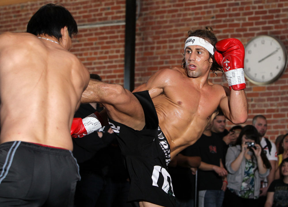 SAN JOSE, CA - NOVEMBER 16:  Urijah Faber works out for the fans and media during the UFC 139 open workouts at the Heroes Martial Arts Gym on November 16, 2011 in San Jose, California.  (Photo by Josh Hedges/Zuffa LLC/Zuffa LLC via Getty Images)