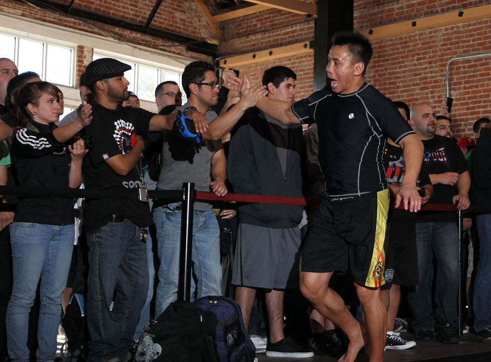 SAN JOSE, CA - NOVEMBER 16:  Cung Le greets fans after working out during the UFC 139 open workouts at the Heroes Martial Arts Gym on November 16, 2011 in San Jose, California.  (Photo by Josh Hedges/Zuffa LLC/Zuffa LLC via Getty Images)