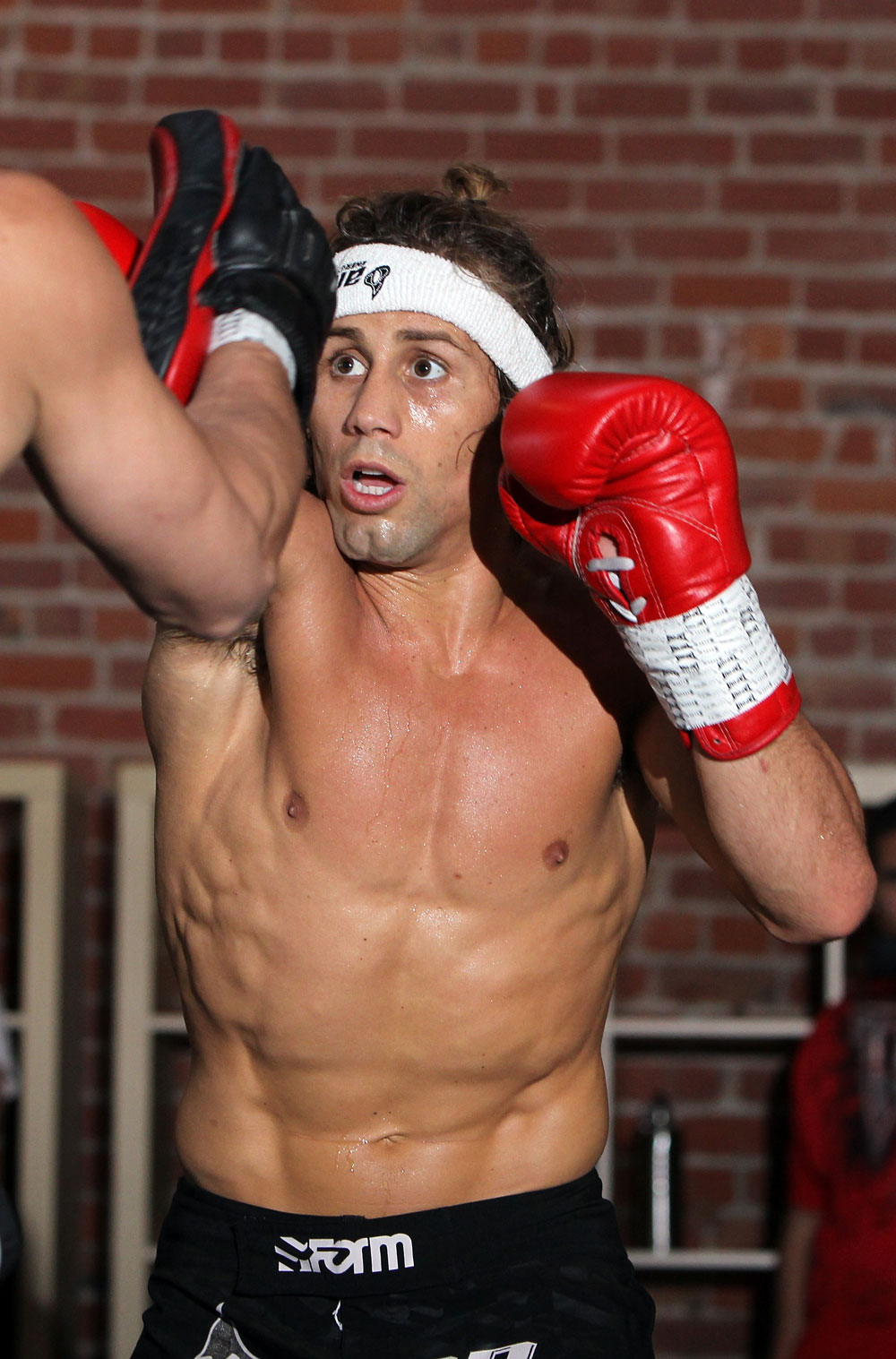SAN JOSE, CA - NOVEMBER 16:  Urijah Faber works out for the fans and media during the UFC 139 open workouts at the Heroes Martial Arts Gym on November 16, 2011 in San Jose, California.  (Photo by Josh Hedges/Zuffa LLC/Zuffa LLC via Getty Images)