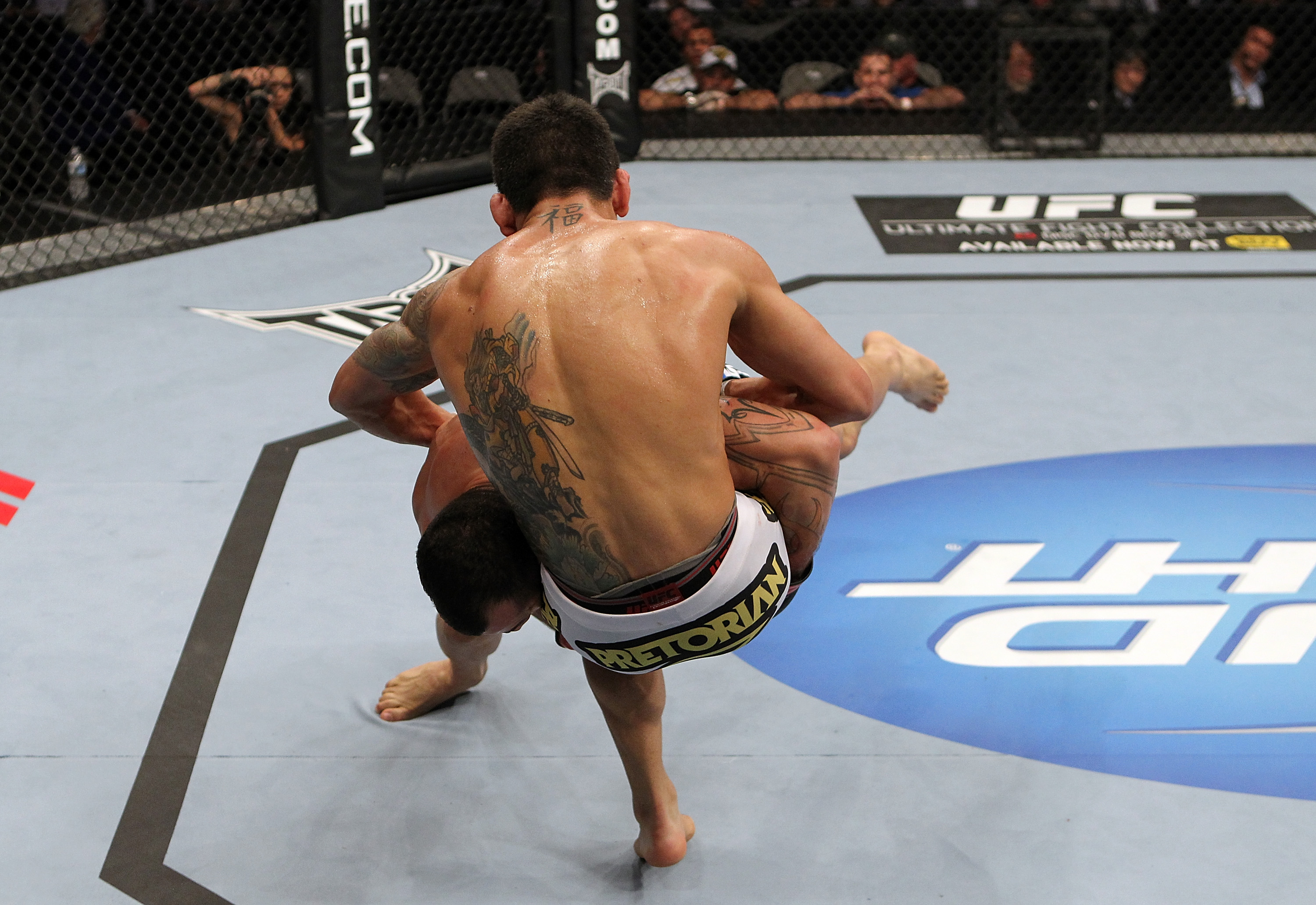 SAN JOSE, CA - NOVEMBER 19: (L-R) Gleison Tibau slams Rafael dos Anjos to the mat during an UFC Lightweight bout at the HP Pavillion on November 19, 2011 in San Jose, California. (Photo by Josh Hedges/Zuffa LLC/Zuffa LLC via Getty Images)