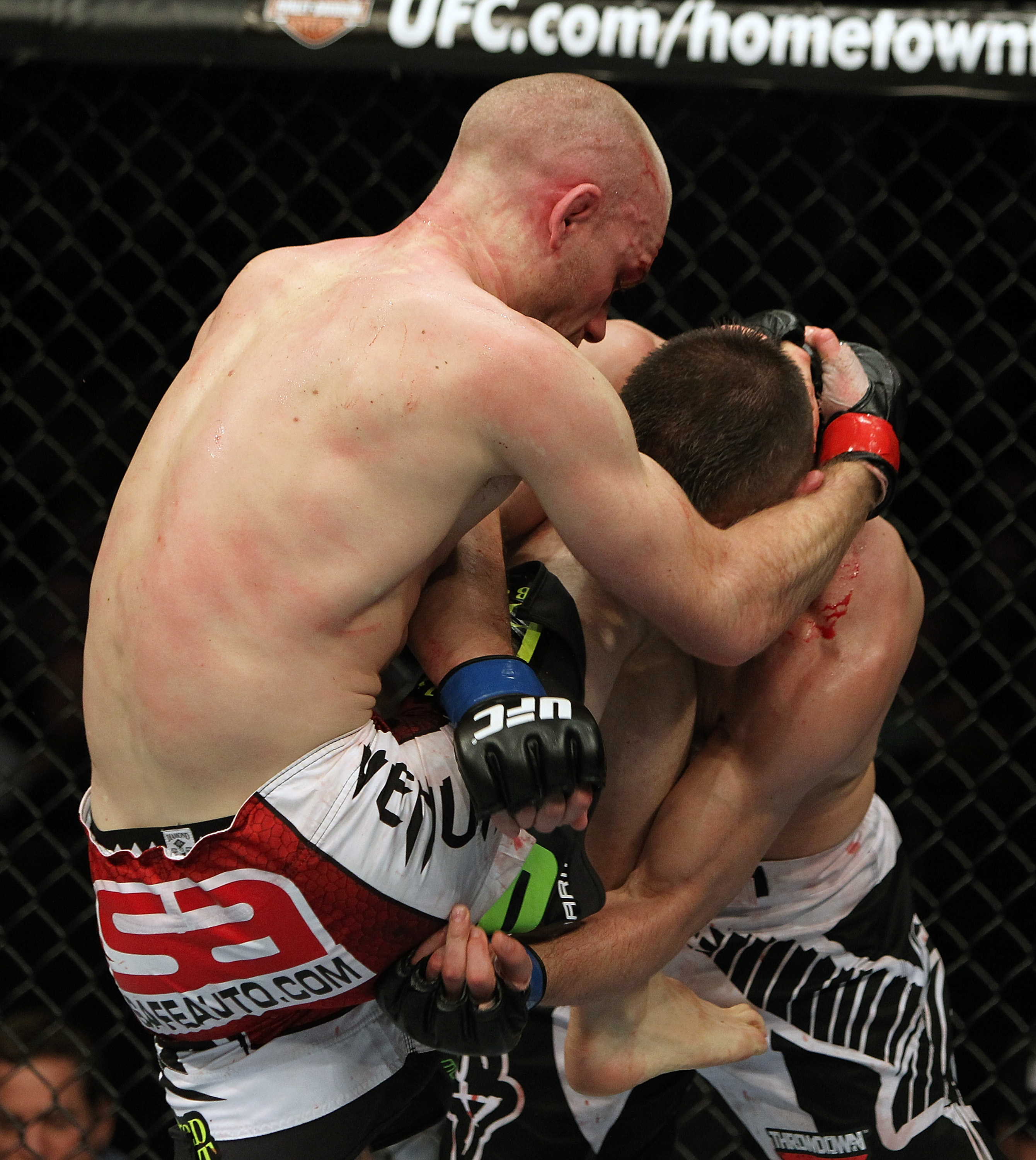 SAN JOSE, CA - NOVEMBER 19: (L-R) Martin Kampmann knees Rick Story during an UFC Welterweight bout at the HP Pavilion on November 19, 2011 in San Jose, California. (Photo by Josh Hedges/Zuffa LLC/Zuffa LLC via Getty Images)
