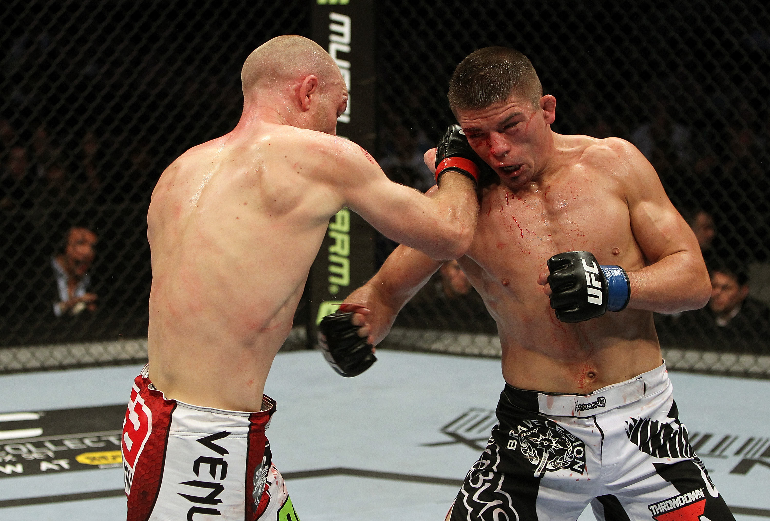 SAN JOSE, CA - NOVEMBER 19: (L-R) Martin Kampmann punches Rick Story during an UFC Welterweight bout at the HP Pavillion on November 19, 2011 in San Jose, California. (Photo by Josh Hedges/Zuffa LLC/Zuffa LLC via Getty Images)