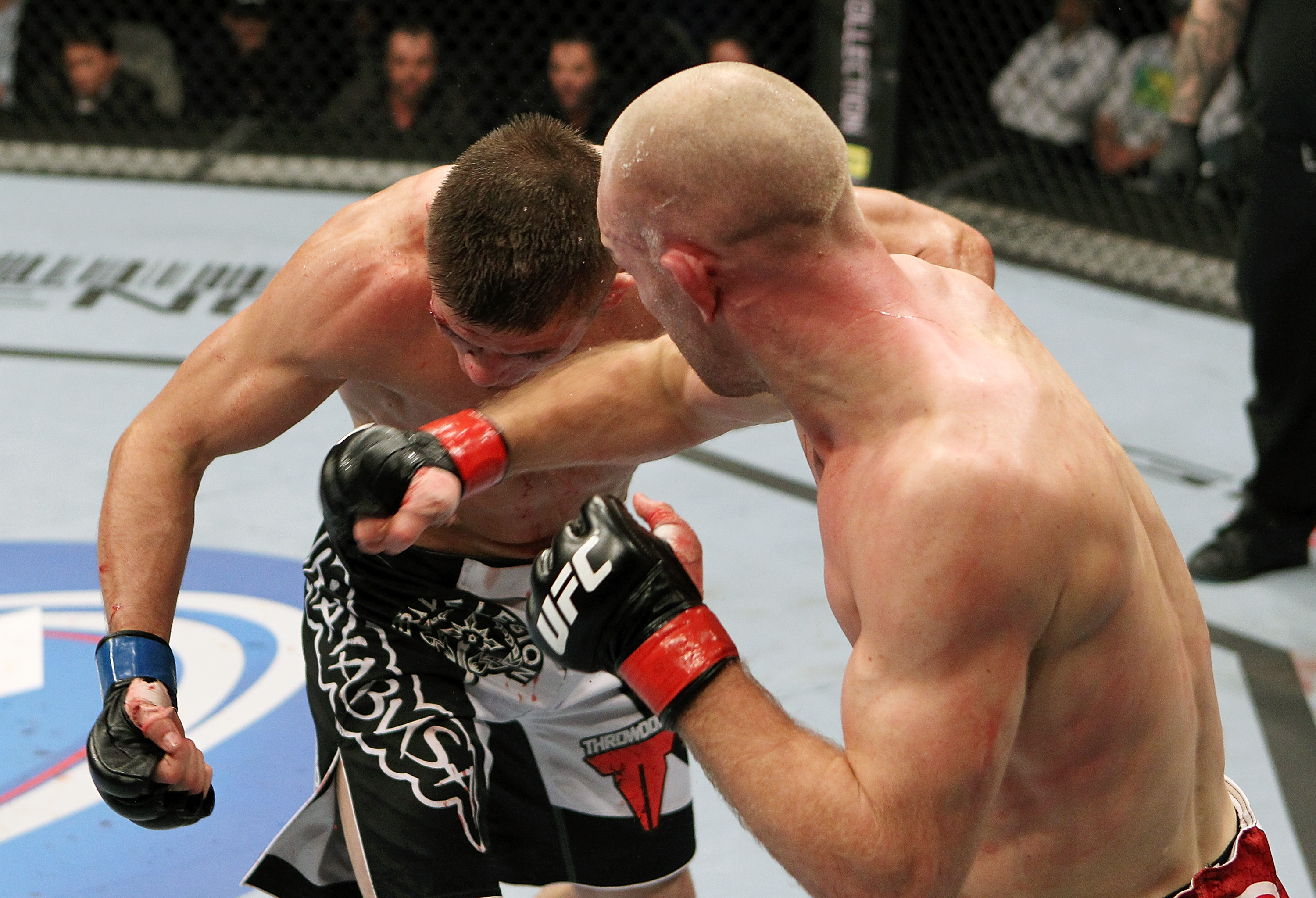 SAN JOSE, CA - NOVEMBER 19: (R-L) Martin Kampmann punches Rick Story during an UFC Welterweight bout at the HP Pavillion on November 19, 2011 in San Jose, California. (Photo by Josh Hedges/Zuffa LLC/Zuffa LLC via Getty Images)