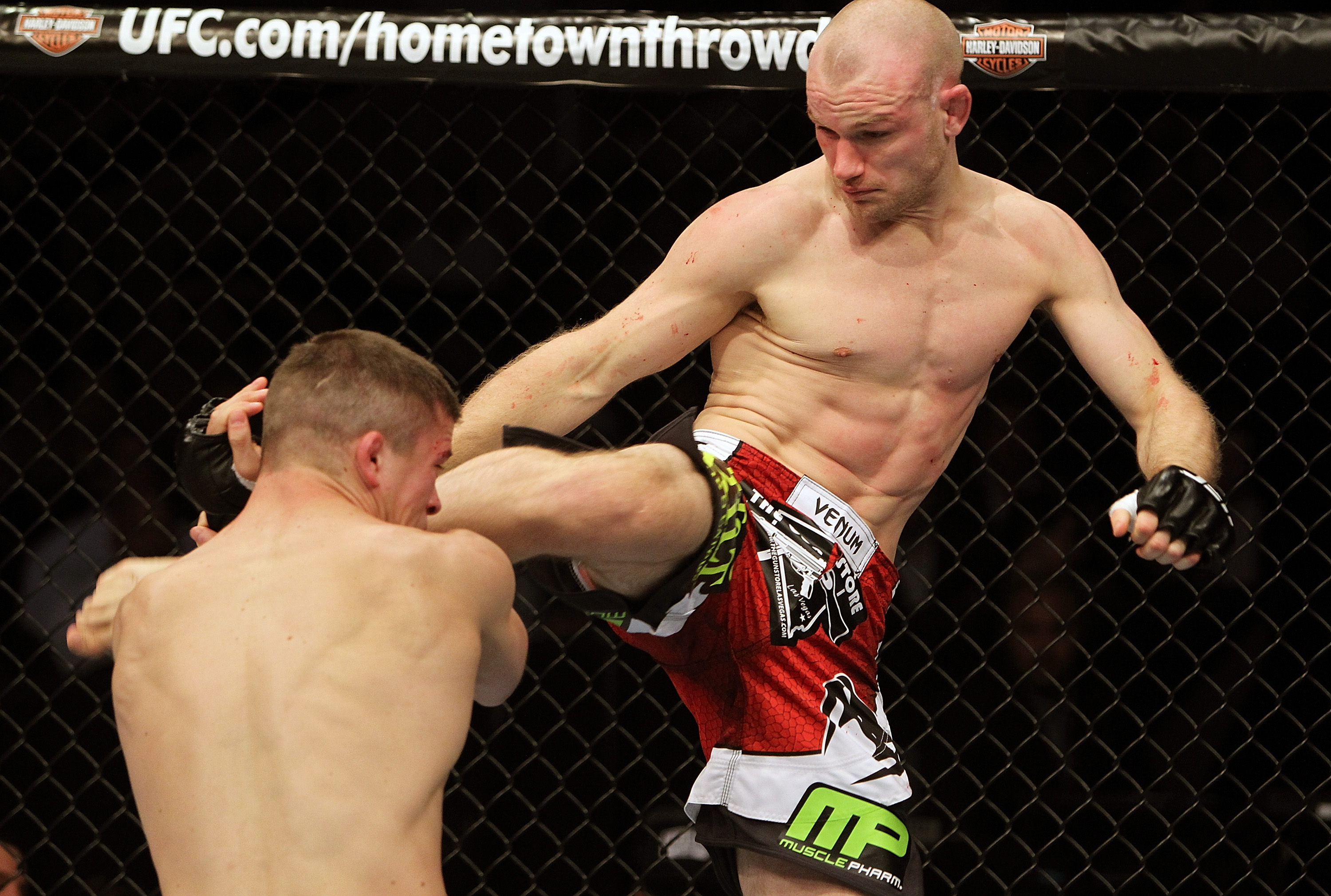 SAN JOSE, CA - NOVEMBER 19: (R-L) Martin Kampmann kicks Rick Story during an UFC Welterweight bout at the HP Pavillion on November 19, 2011 in San Jose, California. (Photo by Josh Hedges/Zuffa LLC/Zuffa LLC via Getty Images)