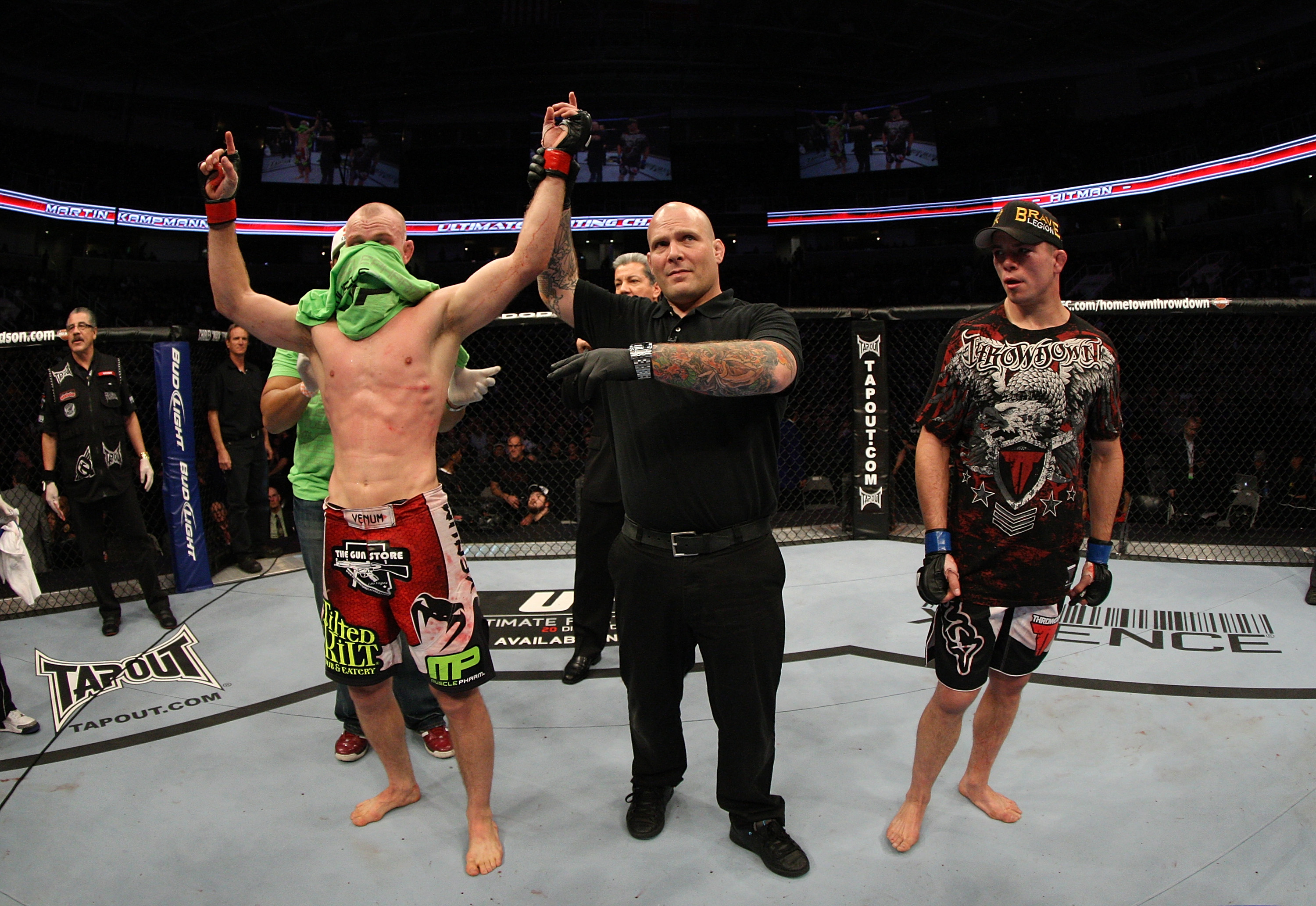 SAN JOSE, CA - NOVEMBER 19: (L-R) Martin Kampmann celebrates defeating Rick Story during an UFC Welterweight bout at the HP Pavillion on November 19, 2011 in San Jose, California. (Photo by Josh Hedges/Zuffa LLC/Zuffa LLC via Getty Images)