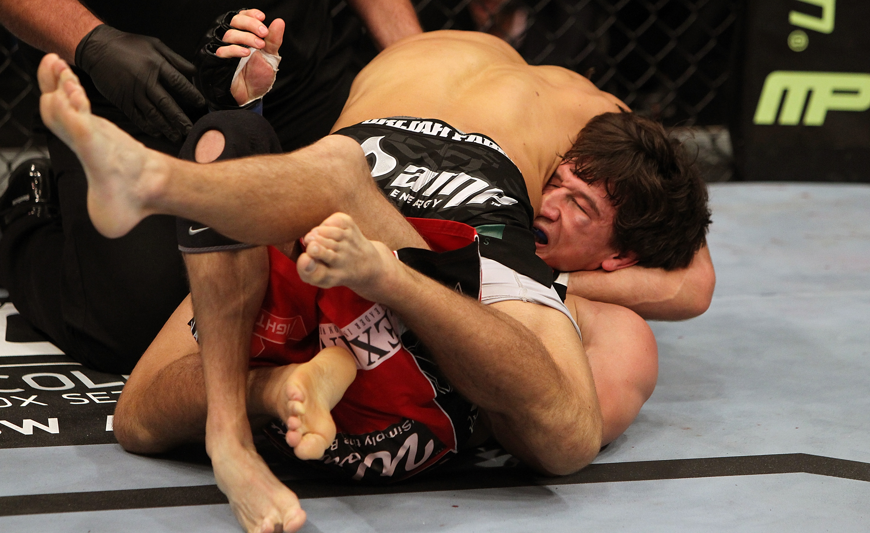 SAN JOSE, CA - NOVEMBER 19: Urijah Faber (top) holds Brian Bowles (bottom) in a head lock during an UFC Bantamweight bout at the HP Pavillion on November 19, 2011 in San Jose, California. (Photo by Josh Hedges/Zuffa LLC/Zuffa LLC via Getty Images)