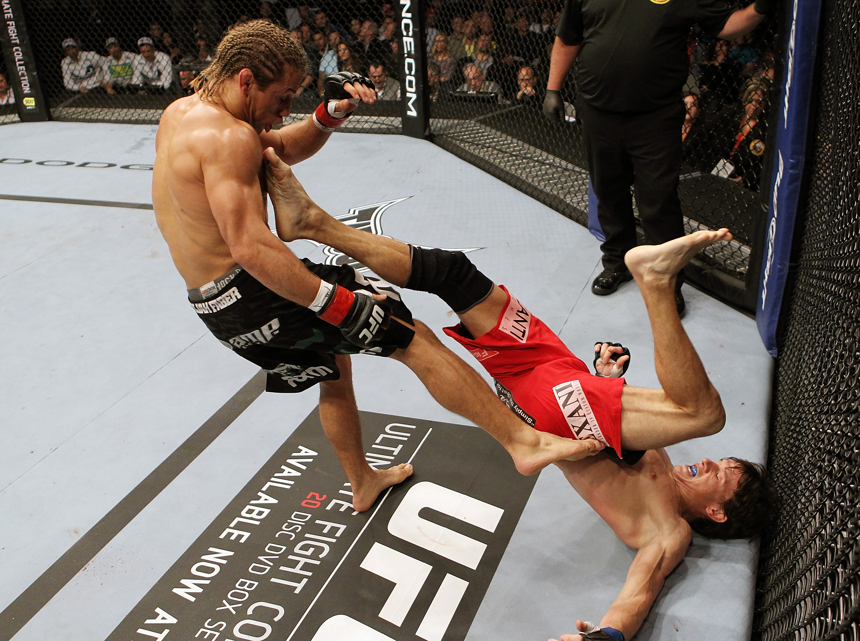 SAN JOSE, CA - NOVEMBER 19: (R-L) Brian Bowles kicks Urijah Faber during an UFC Bantamweight bout at the HP Pavillion on November 19, 2011 in San Jose, California. (Photo by Josh Hedges/Zuffa LLC/Zuffa LLC via Getty Images)