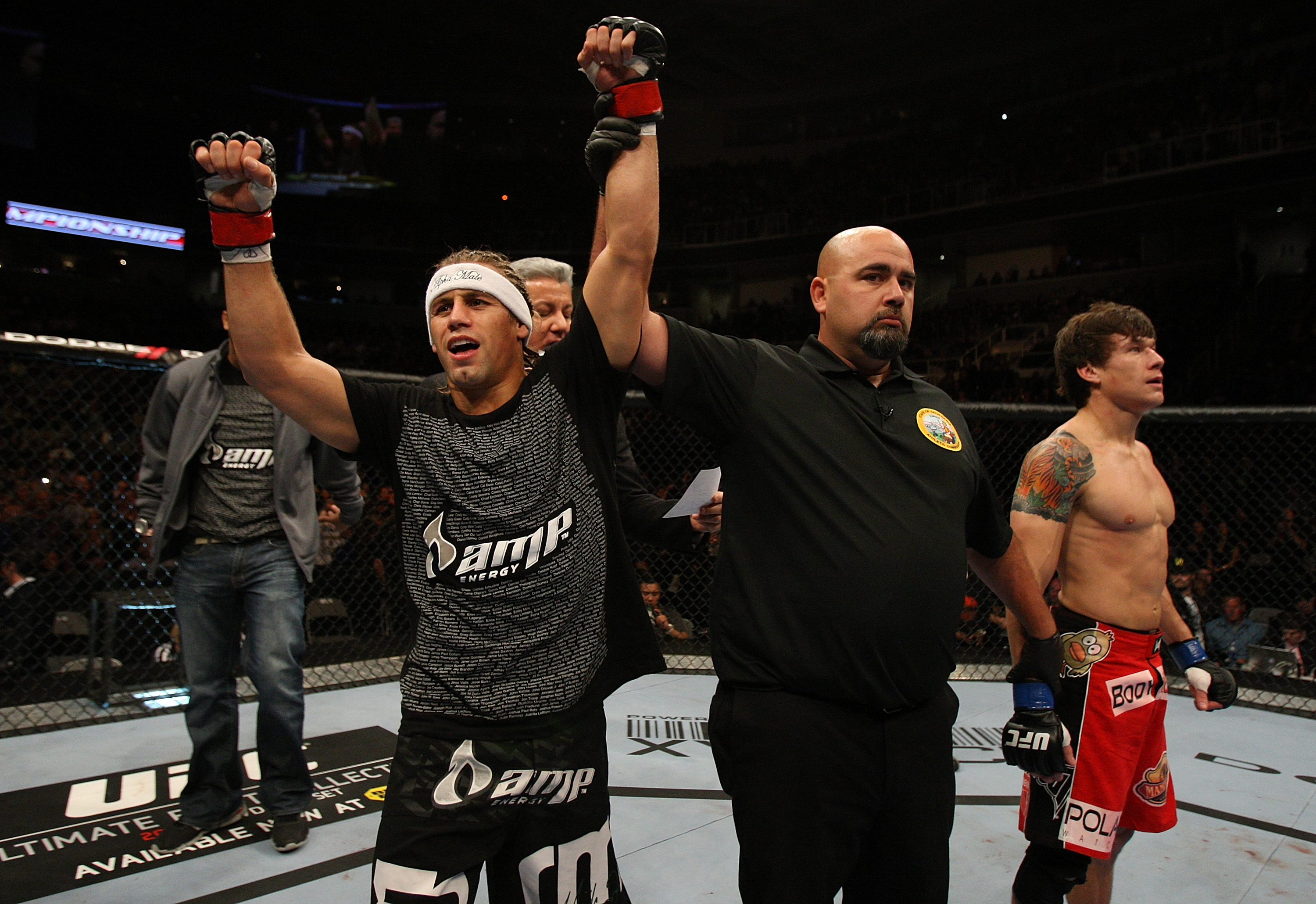 SAN JOSE, CA - NOVEMBER 19: Urijah Faber celebrates defeating Brian Bowles during an UFC Bantamweight bout at the HP Pavillion on November 19, 2011 in San Jose, California. (Photo by Josh Hedges/Zuffa LLC/Zuffa LLC via Getty Images)