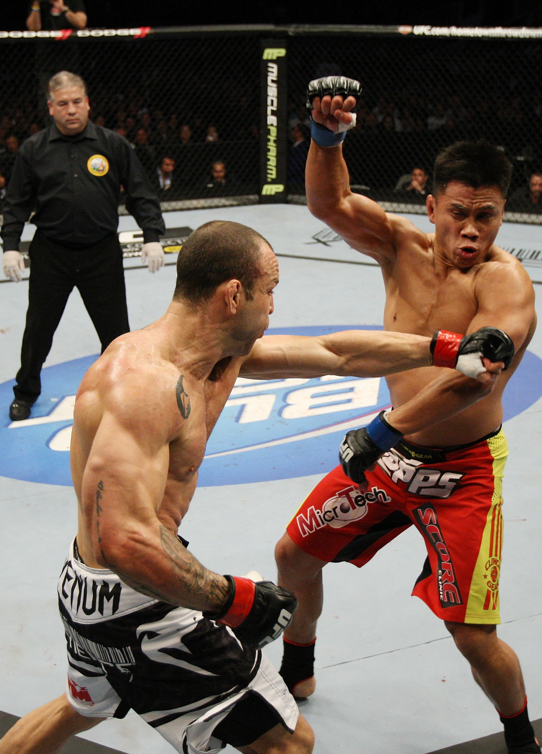 SAN JOSE, CA - NOVEMBER 19: (L-R) Wanderlei Silva throws a punch that misses Cung Le during an UFC Middleweight bout at the HP Pavillion on November 19, 2011 in San Jose, California. (Photo by Josh Hedges/Zuffa LLC/Zuffa LLC via Getty Images)
