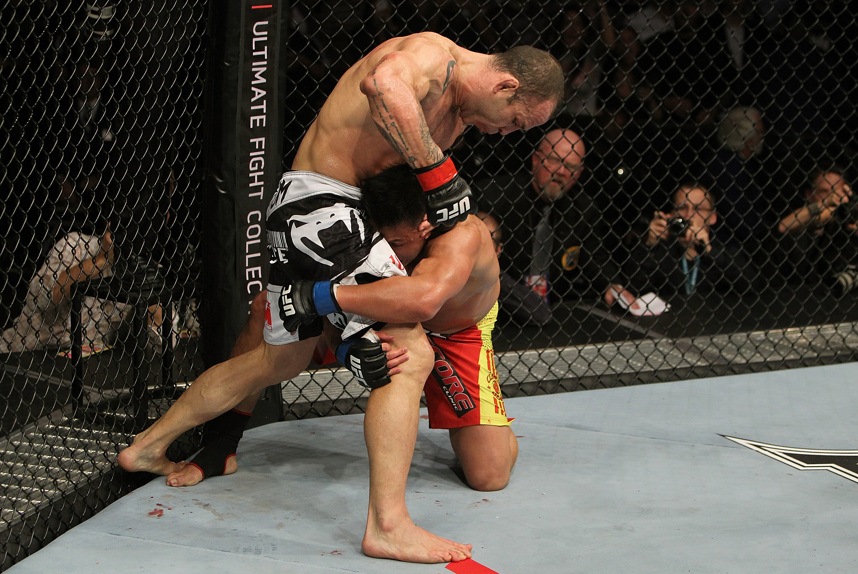 SAN JOSE, CA - NOVEMBER 19: (L-R) Wanderlei Silva punches Cung Le wrapped arund his leg during an UFC Middleweight bout at the HP Pavillion on November 19, 2011 in San Jose, California. (Photo by Josh Hedges/Zuffa LLC/Zuffa LLC via Getty Images)