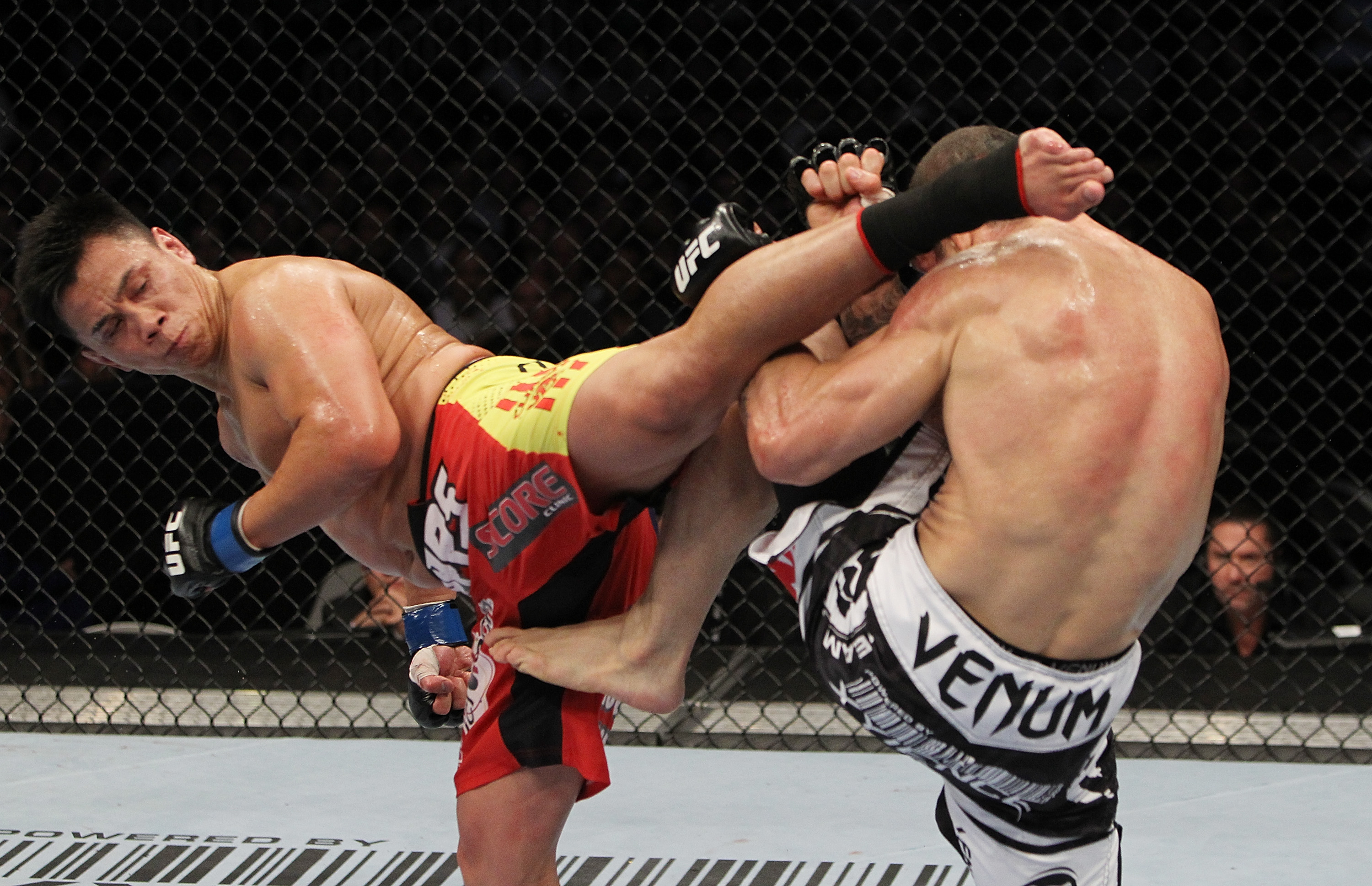 SAN JOSE, CA - NOVEMBER 19: (R-L) Wanderlei Silva and Cung Le exchange kicks during an UFC Middleweight bout at the HP Pavillion on November 19, 2011 in San Jose, California. (Photo by Josh Hedges/Zuffa LLC/Zuffa LLC via Getty Images)