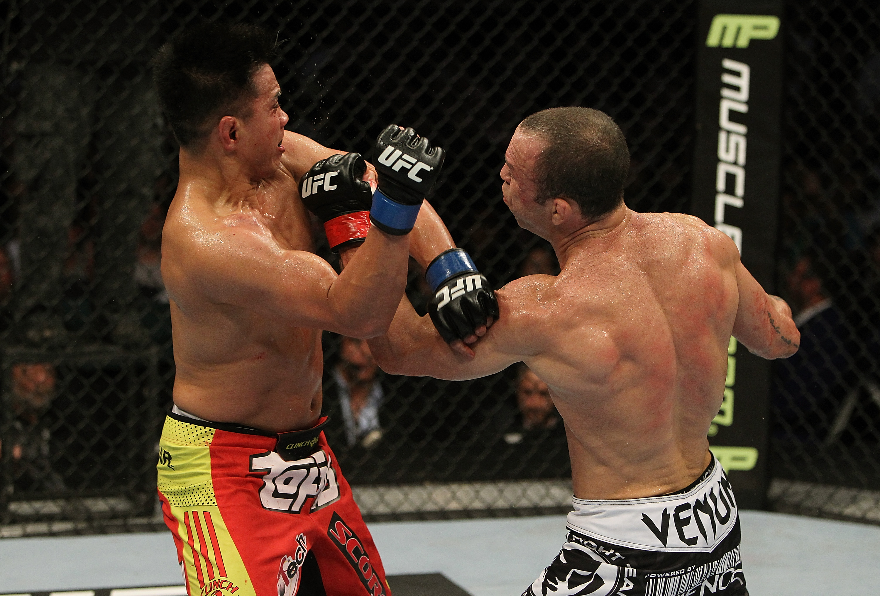 SAN JOSE, CA - NOVEMBER 19: (R-L) Wanderlei Silva punches Cung Le during an UFC Middleweight bout at the HP Pavillion on November 19, 2011 in San Jose, California. (Photo by Josh Hedges/Zuffa LLC/Zuffa LLC via Getty Images)