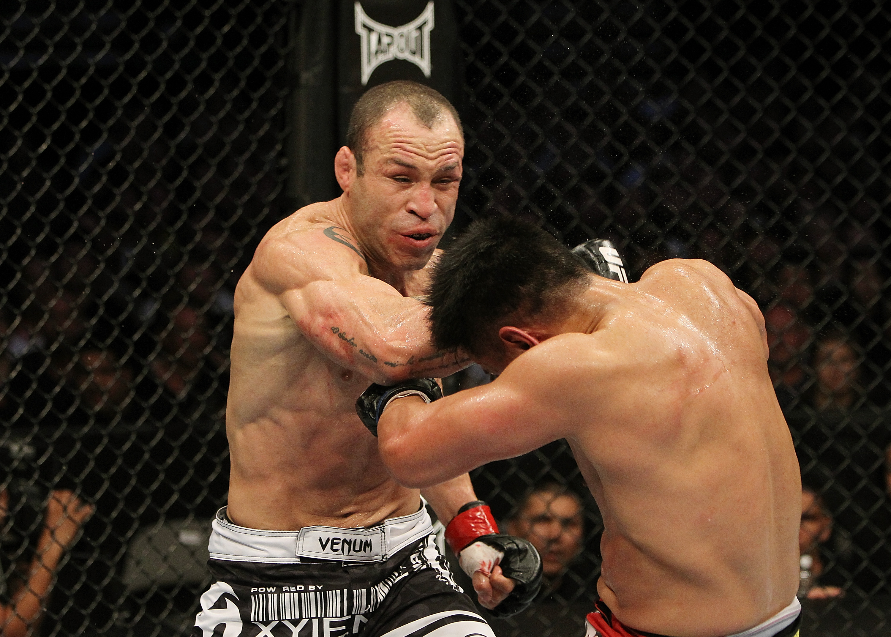 SAN JOSE, CA - NOVEMBER 19: (L-R) Wanderlei Silva punches Cung Le during an UFC Middleweight bout at the HP Pavillion on November 19, 2011 in San Jose, California. (Photo by Josh Hedges/Zuffa LLC/Zuffa LLC via Getty Images)