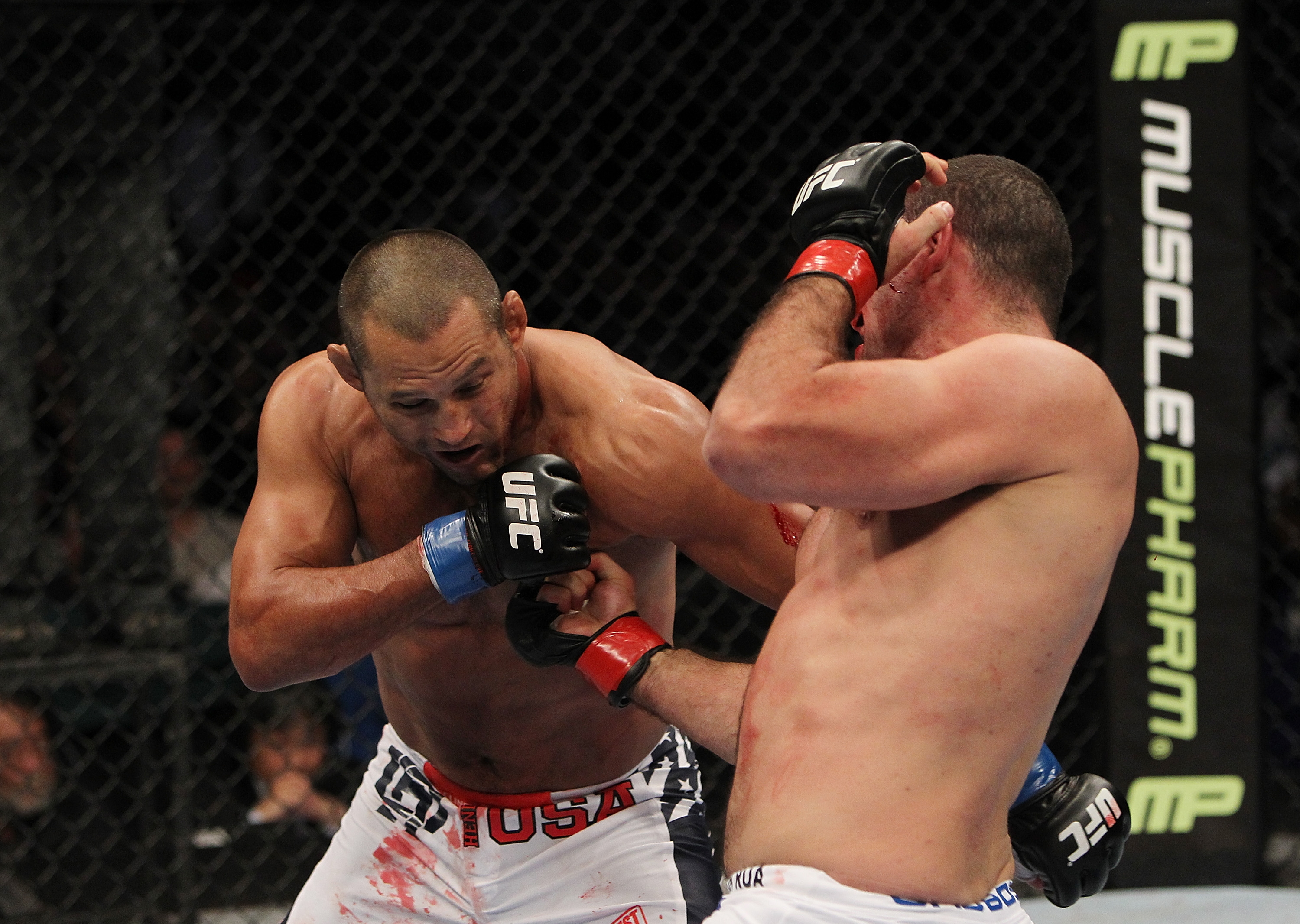 SAN JOSE, CA - NOVEMBER 19: (R-L) Mauricio Rua and Dan Henderson exchange punches during an UFC Light Heavyweight bout at the HP Pavillion on November 19, 2011 in San Jose, California. (Photo by Josh Hedges/Zuffa LLC/Zuffa LLC via Getty Images)