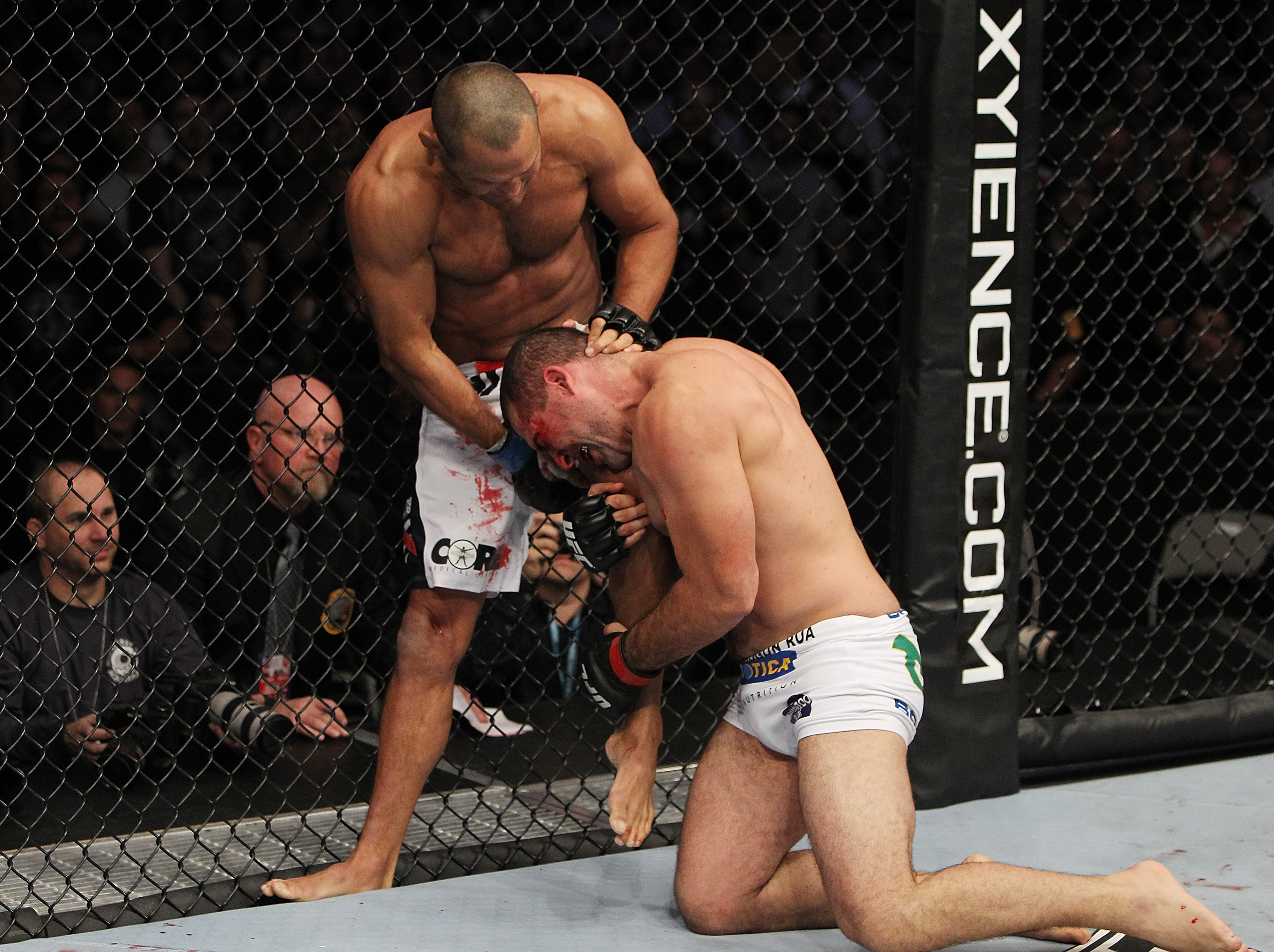 SAN JOSE, CA - NOVEMBER 19: (R-L) Mauricio Rua grabs hold of Dan Henderson's leg while taking a punch during an UFC Light Heavyweight bout at the HP Pavillion on November 19, 2011 in San Jose, California. (Photo by Josh Hedges/Zuffa LLC/Zuffa LLC via Getty Images)
