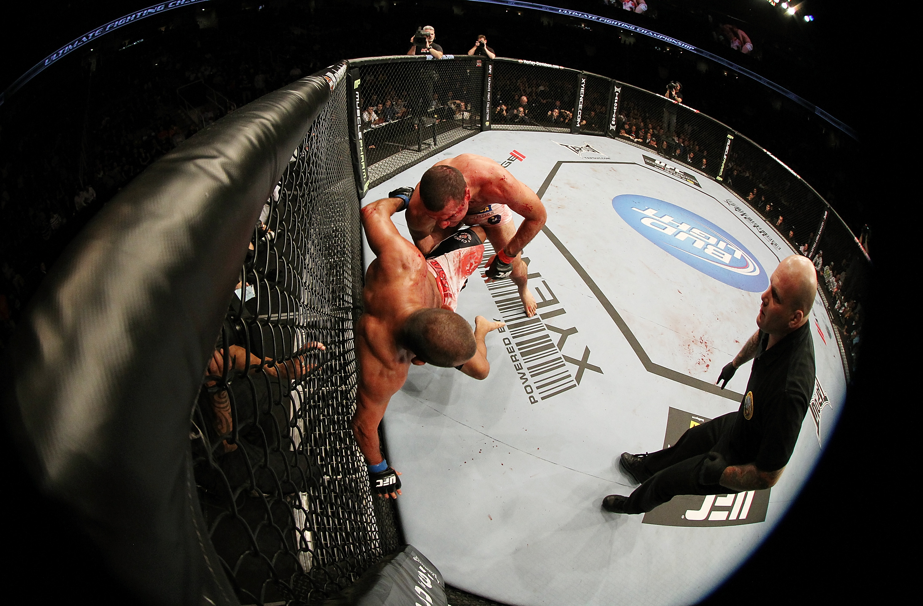 SAN JOSE, CA - NOVEMBER 19: Mauricio Rua (top) attacks Dan Henderson (bottom) up against the righ during an UFC Light Heavyweight bout at the HP Pavillion on November 19, 2011 in San Jose, California. (Photo by Josh Hedges/Zuffa LLC/Zuffa LLC via Getty Images)