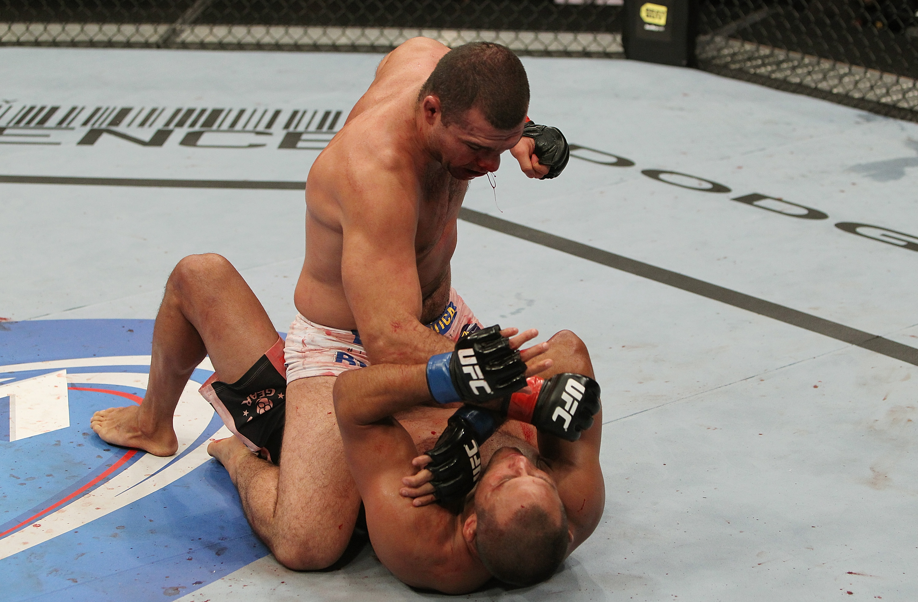 SAN JOSE, CA - NOVEMBER 19: Mauricio Rua (top) punches Dan Henderson (bottom) during an UFC Light Heavyweight bout at the HP Pavillion on November 19, 2011 in San Jose, California. (Photo by Josh Hedges/Zuffa LLC/Zuffa LLC via Getty Images)