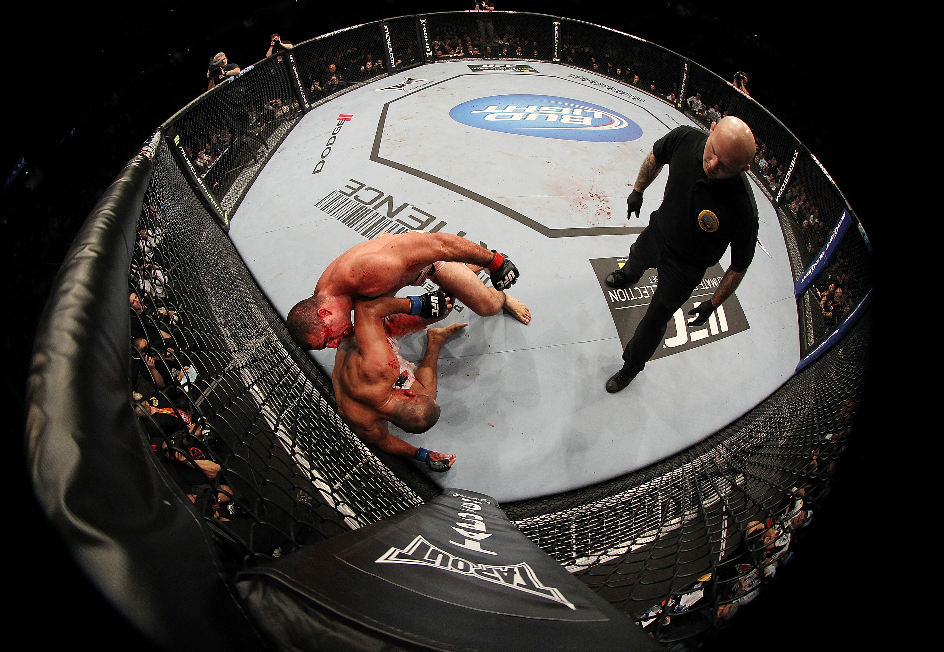 SAN JOSE, CA - NOVEMBER 19: Mauricio Rua (top) attacks Dan Henderson (bottom) up against the righ during an UFC Light Heavyweight bout at the HP Pavillion on November 19, 2011 in San Jose, California. (Photo by Josh Hedges/Zuffa LLC/Zuffa LLC via Getty Images)