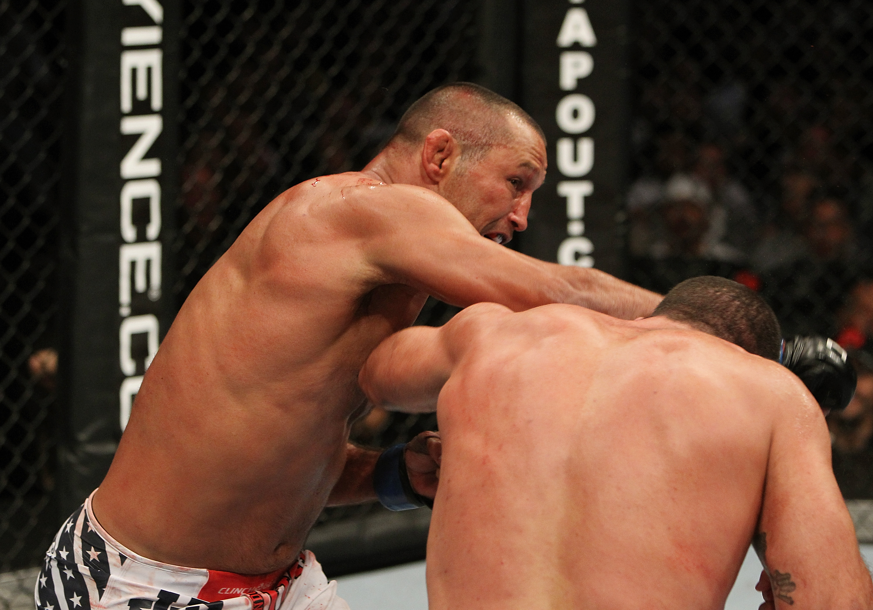 SAN JOSE, CA - NOVEMBER 19: (R-L) Mauricio Rua and Dan Henderson exchange punches during an UFC Light Heavyweight bout at the HP Pavillion on November 19, 2011 in San Jose, California. (Photo by Josh Hedges/Zuffa LLC/Zuffa LLC via Getty Images)