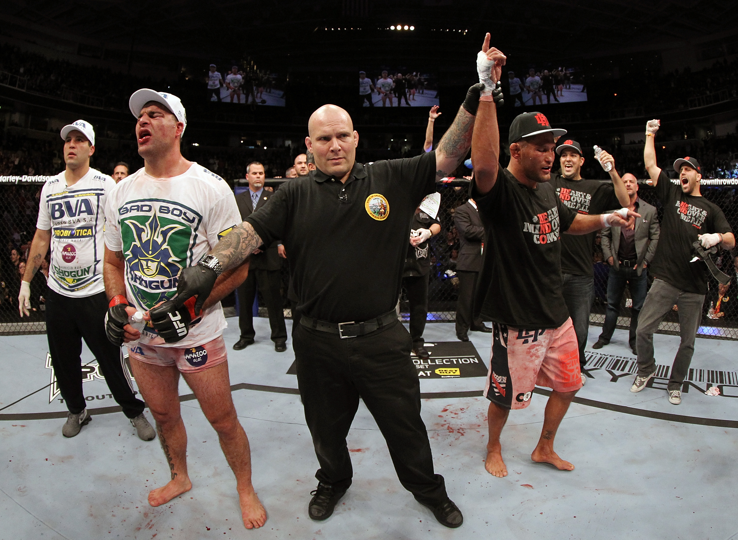 SAN JOSE, CA - NOVEMBER 19: (R-L) Dan Henderson celebrates defeating Mauricio Rua during a UFC Light Heavyweight bout at the HP Pavilion on November 19, 2011 in San Jose, California. (Photo by Josh Hedges/Zuffa LLC/Zuffa LLC via Getty Images)