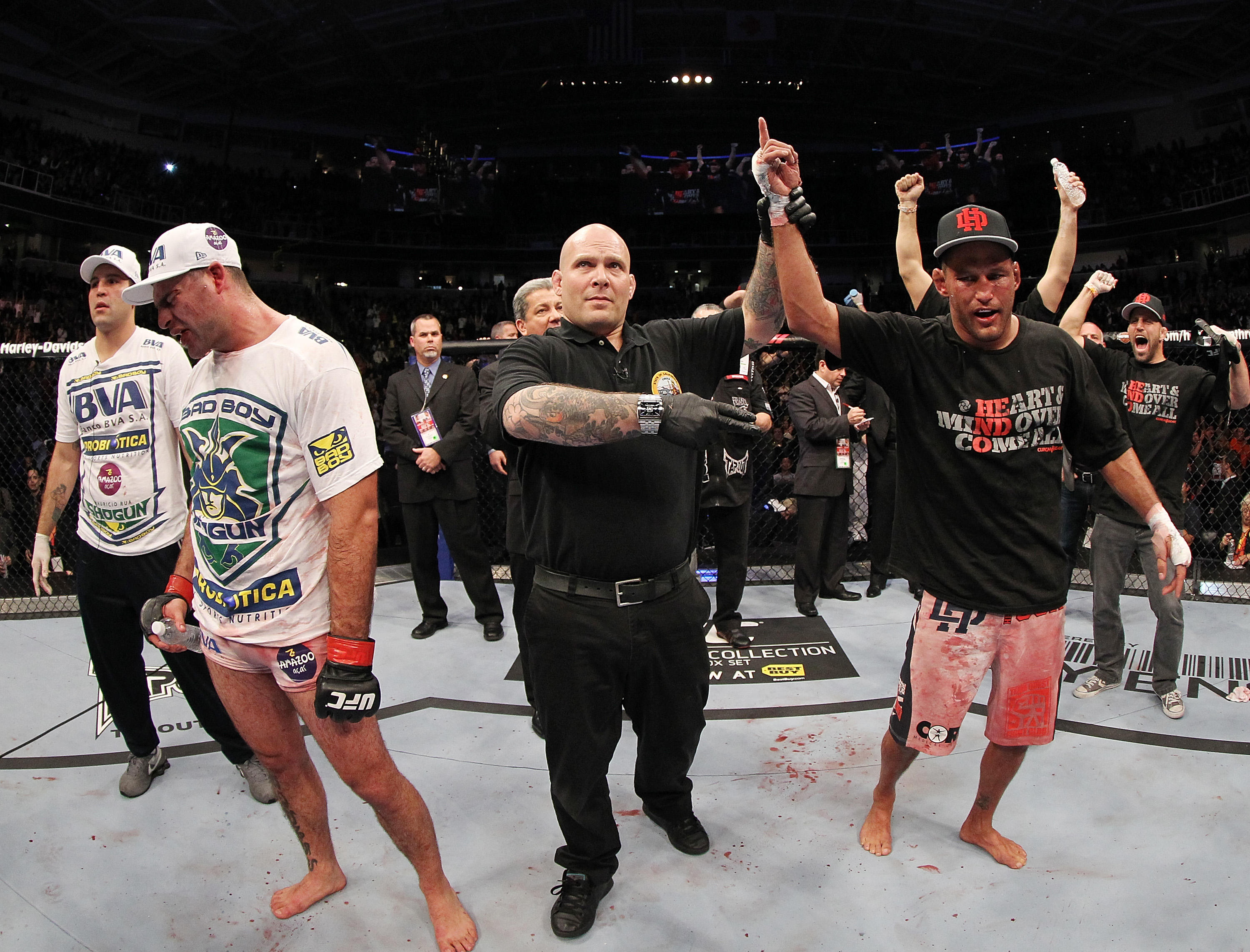 SAN JOSE, CA - NOVEMBER 19: (R-L) Dan Henderson celebrates defeating Mauricio Rua during a UFC Light Heavyweight bout at the HP Pavilion on November 19, 2011 in San Jose, California. (Photo by Josh Hedges/Zuffa LLC/Zuffa LLC via Getty Images)