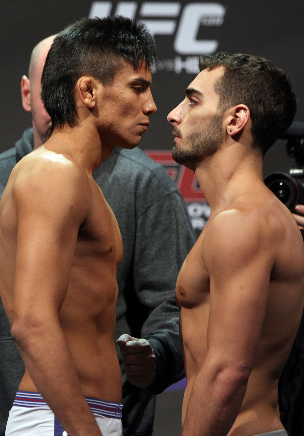 SAN JOSE, CA - NOVEMBER 18: (L-R) Bantamweight opponents Miguel Angel Torres and Nick Pace face off after weighing in during the UFC 139 Weigh In at the HP Pavilion on November 18, 2011 in San Jose, California. (Photo by Josh Hedges/Zuffa LLC/Zuffa LLC via Getty Images)