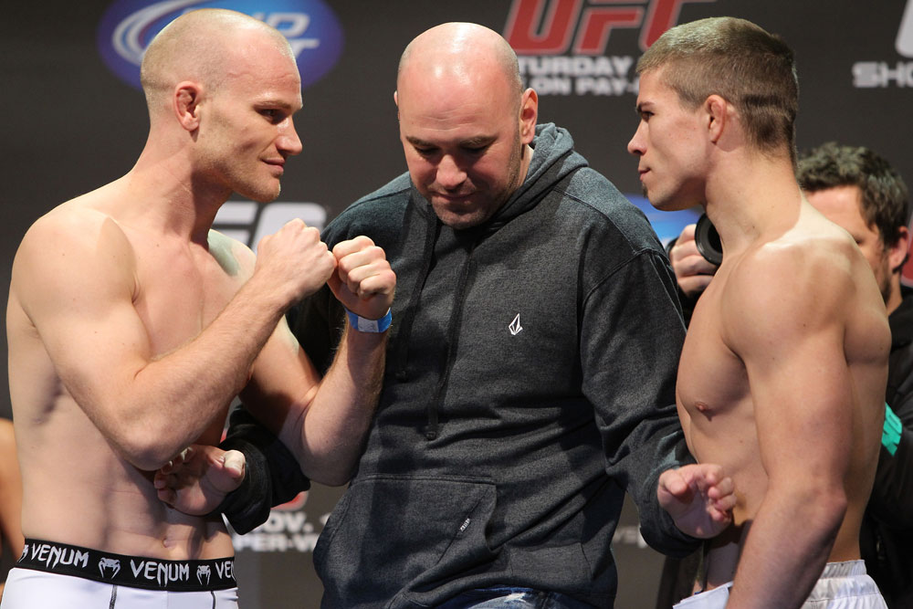 SAN JOSE, CA - NOVEMBER 18: (L-R) Welterweight opponents Martin Kampmann and Rick Story are separated by UFC president Dana White as they face off after weighing in during the UFC 139 Weigh In at the HP Pavilion on November 18, 2011 in San Jose, California. (Photo by Josh Hedges/Zuffa LLC/Zuffa LLC via Getty Images)