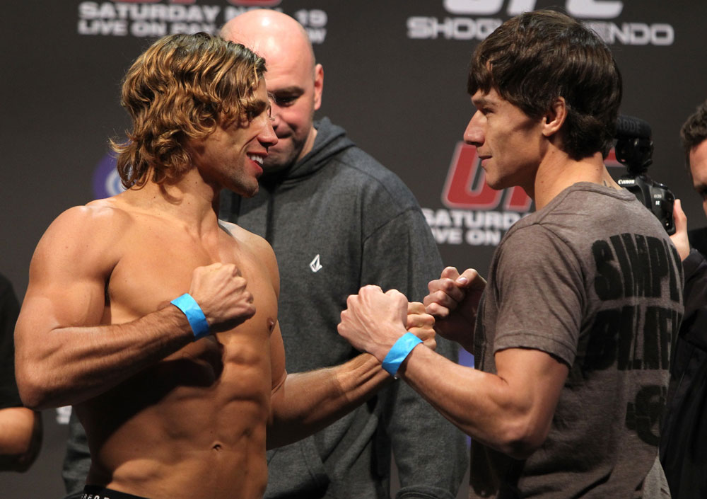 SAN JOSE, CA - NOVEMBER 18: (L-R) Bantamweight opponents Urijah Faber and Brian Bowles face off after weighing in during the UFC 139 Weigh In at the HP Pavilion on November 18, 2011 in San Jose, California. (Photo by Josh Hedges/Zuffa LLC/Zuffa LLC via Getty Images)