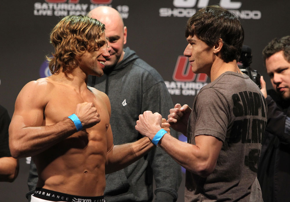 SAN JOSE, CA - NOVEMBER 18: (L-R) Bantamweight opponents Urijah Faber and Brian Bowles face off after weighing in during the UFC 139 Weigh In at the HP Pavilion on November 18, 2011 in San Jose, California. (Photo by Josh Hedges/Zuffa LLC/Zuffa LLC via Getty Images)