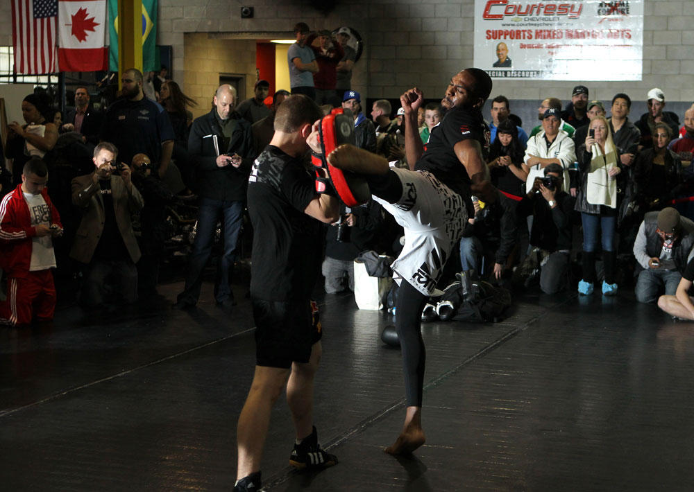 TORONTO, ON - DECEMBER 07:  UFC Light Heavyweight Champion Jon "Bones" Jones works out for the fans and media during the UFC 140 Open Workouts at the Xtreme Couture Gym on December 7, 2011 in Toronto, Ontario.  (Photo by Josh Hedges/Zuffa LLC/Zuffa LLC via Getty Images)