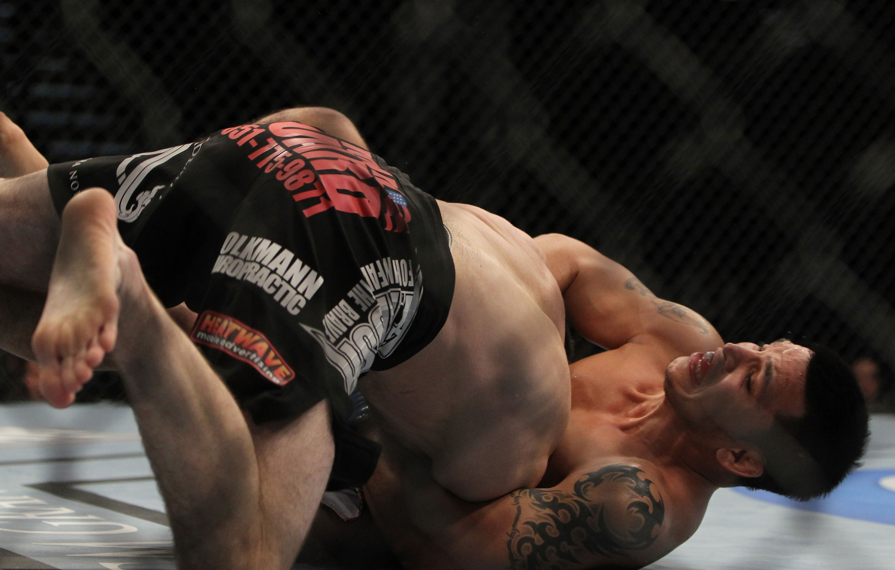 LAS VEGAS, NV - DECEMBER 30: Efrain Escudero (right) attempts to submit Jacob Volkmann during the UFC 141 event at the MGM Grand Garden Arena on December 30, 2011 in Las Vegas, Nevada. (Photo by Josh Hedges/Zuffa LLC/Zuffa LLC via Getty Images) *** Local Caption *** Efrain Escudero; Jacob Volkmann