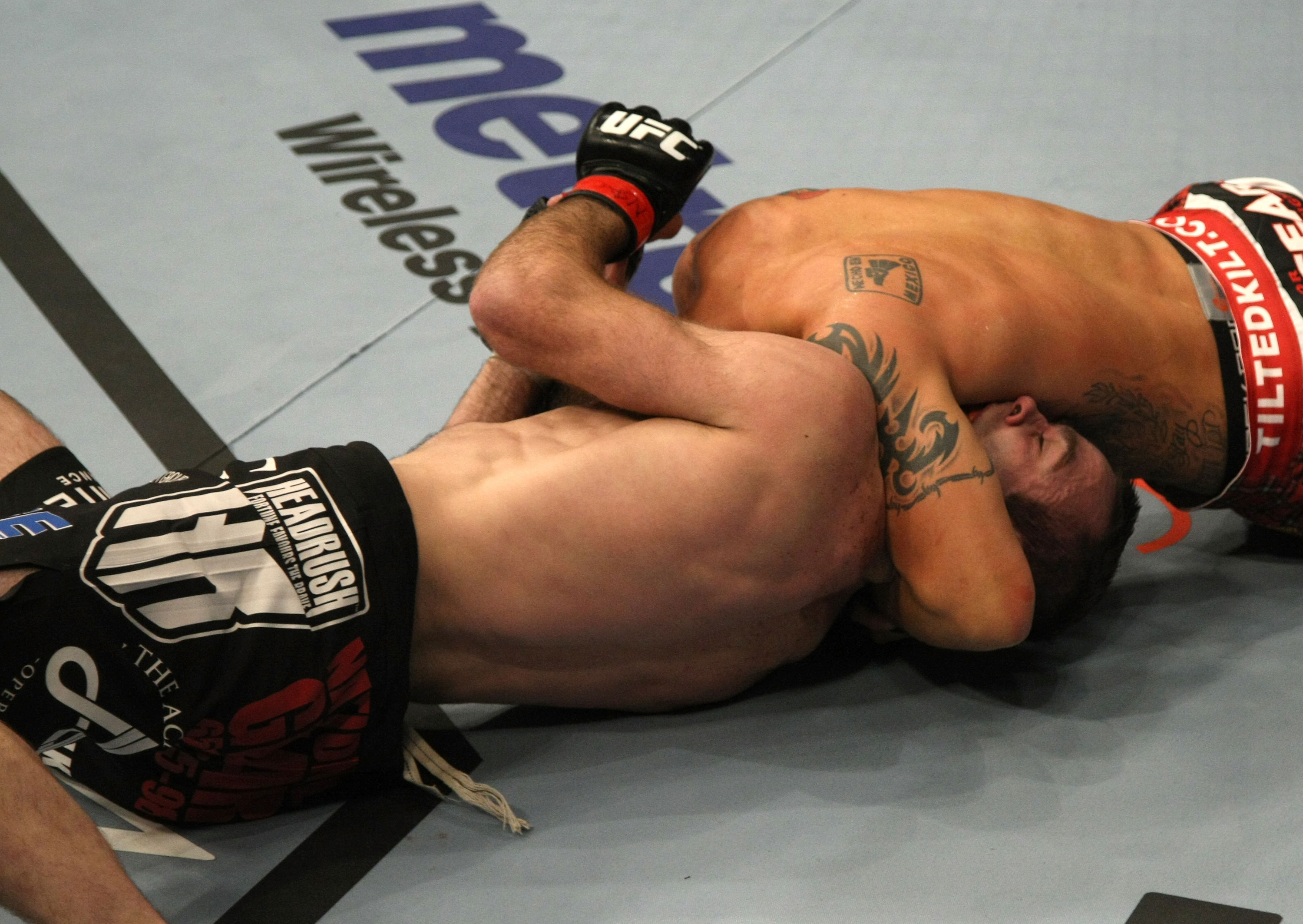 LAS VEGAS, NV - DECEMBER 30: Efrain Escudero (right) attempts to submit Jacob Volkmann with a choke during the UFC 141 event at the MGM Grand Garden Arena on December 30, 2011 in Las Vegas, Nevada. (Photo by Donald Miralle/Zuffa LLC/Zuffa LLC via Getty Images) *** Local Caption *** Efrain Escudero; Jacob Volkmann