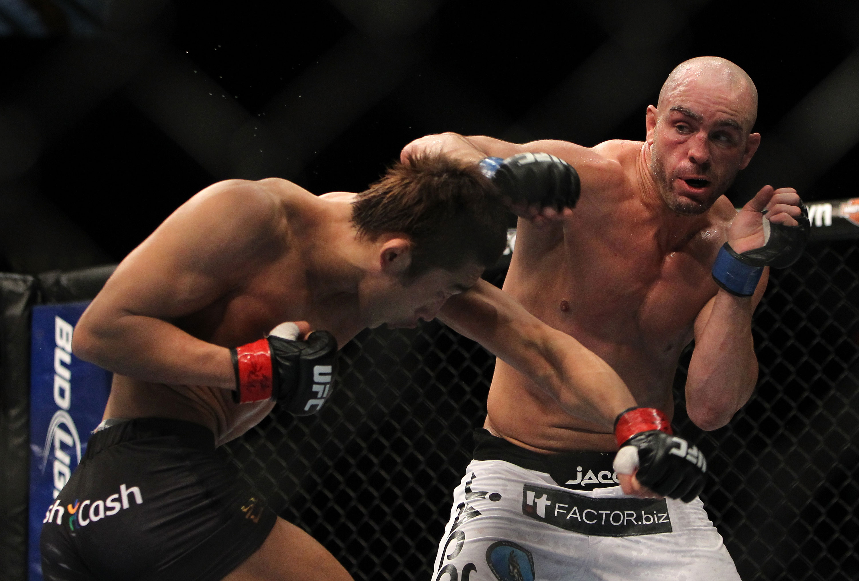 LAS VEGAS, NV - DECEMBER 30: Sean Pierson (right) and Dong Hyun Kim (left) exchange punches during the UFC 141 event at the MGM Grand Garden Arena on December 30, 2011 in Las Vegas, Nevada. (Photo by Josh Hedges/Zuffa LLC/Zuffa LLC via Getty Images) *** Local Caption *** Sean Pierson; Dong Hyun Kim