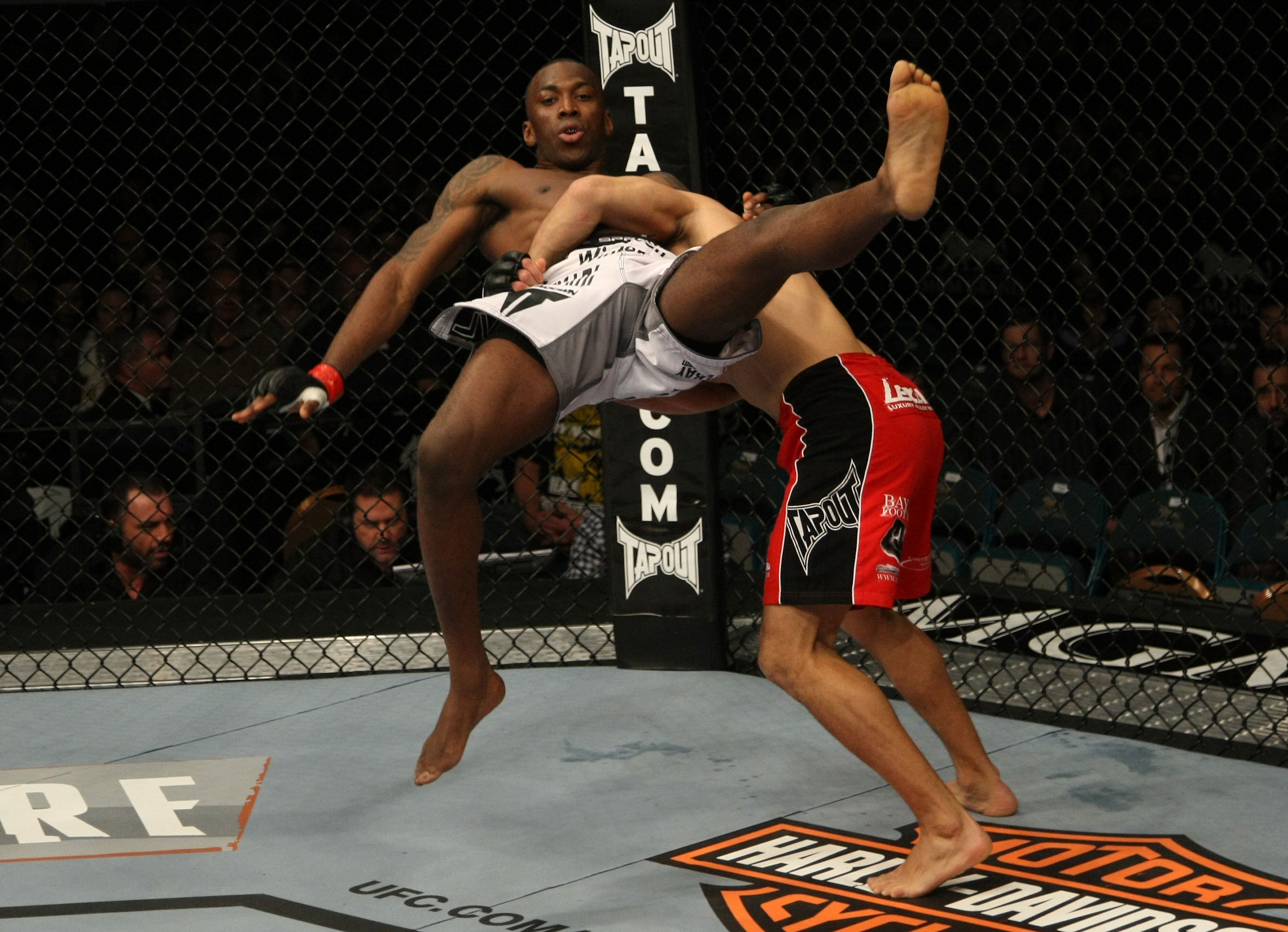 LAS VEGAS, NV - DECEMBER 30: Danny Castillo (red shorts) slams Anthony Njokuani during the UFC 141 event at the MGM Grand Garden Arena on December 30, 2011 in Las Vegas, Nevada. (Photo by Donald Miralle/Zuffa LLC/Zuffa LLC via Getty Images) *** Local Caption *** Anthony Njokuani; Danny Castillo
