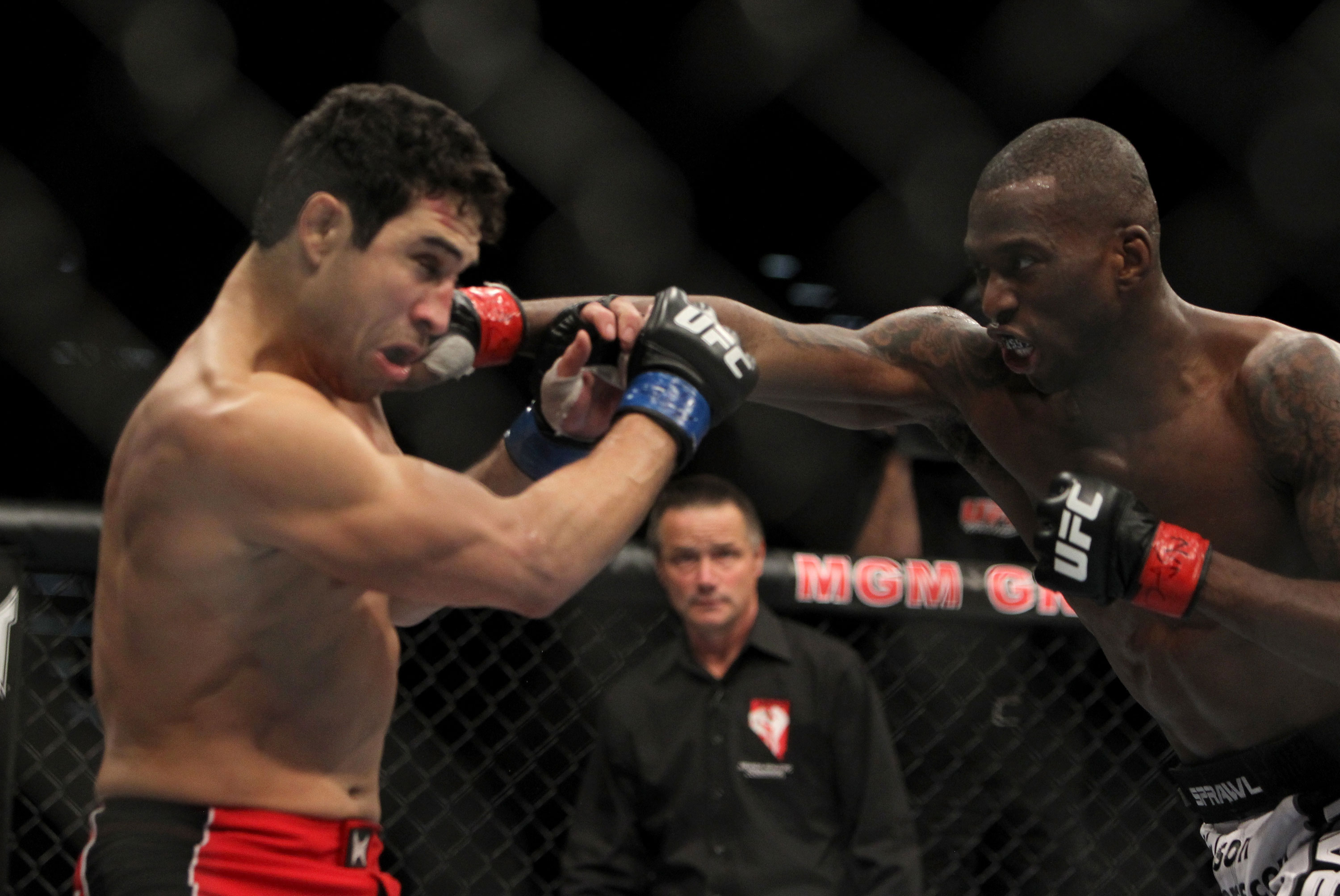LAS VEGAS, NV - DECEMBER 30: Anthony Njokuani (right) punches Danny Castillo (left) during the UFC 141 event at the MGM Grand Garden Arena on December 30, 2011 in Las Vegas, Nevada. (Photo by Josh Hedges/Zuffa LLC/Zuffa LLC via Getty Images) *** Local Caption *** Anthony Njokuani; Danny Castillo
