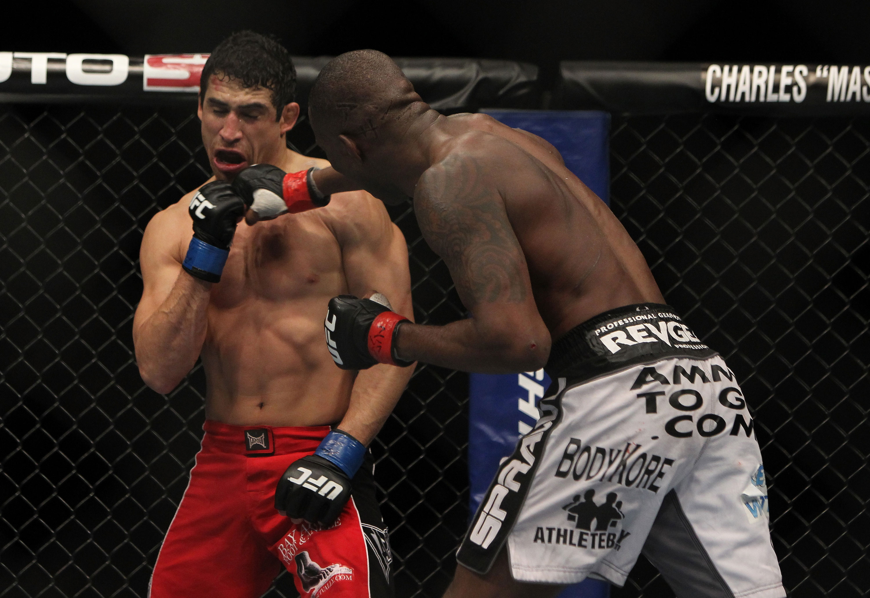 LAS VEGAS, NV - DECEMBER 30: Anthony Njokuani (right) punches Danny Castillo (left) during the UFC 141 event at the MGM Grand Garden Arena on December 30, 2011 in Las Vegas, Nevada. (Photo by Josh Hedges/Zuffa LLC/Zuffa LLC via Getty Images) *** Local Caption *** Anthony Njokuani; Danny Castillo