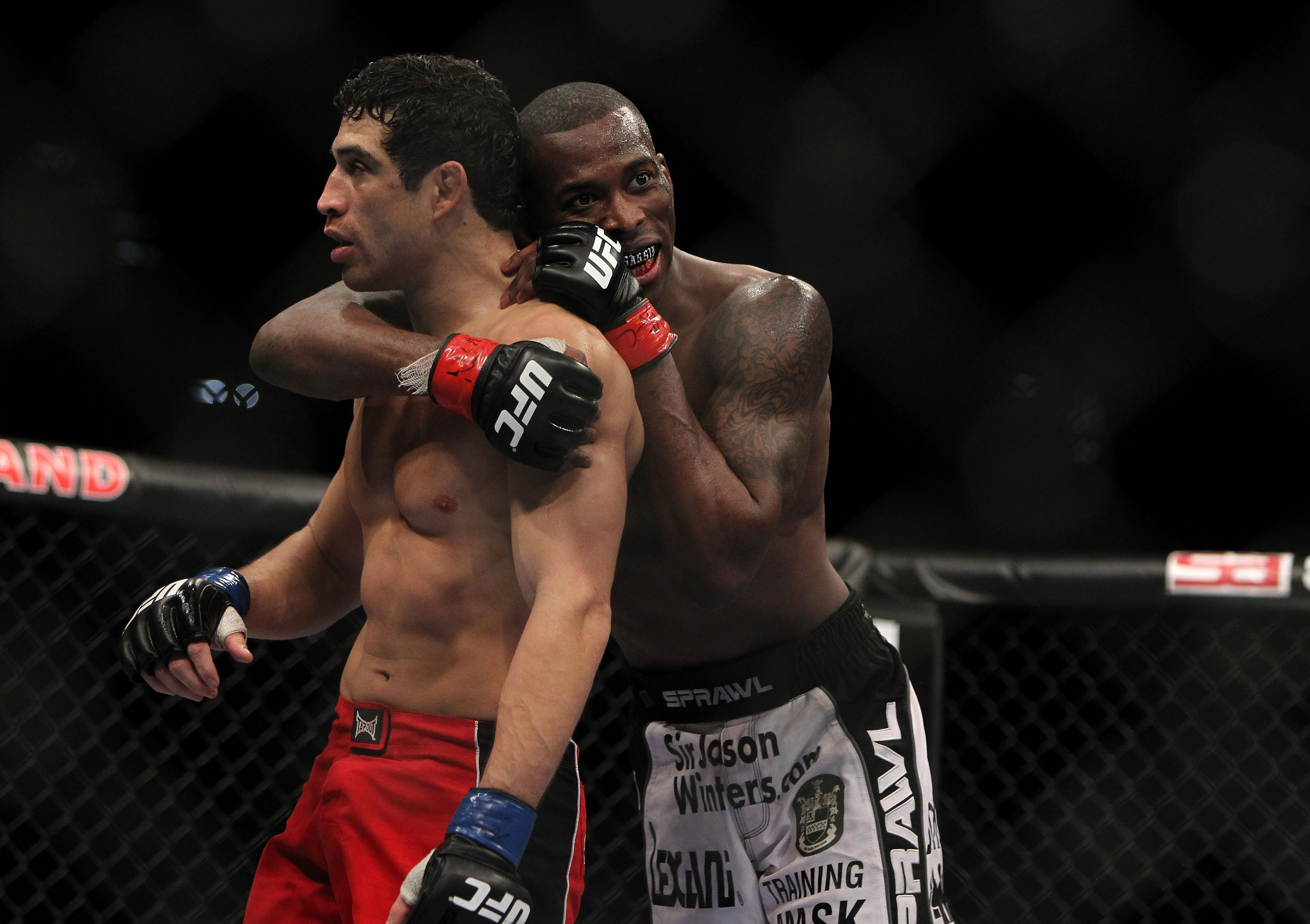 LAS VEGAS, NV - DECEMBER 30: Danny Castillo (left) and Anthony Njokuani (right) after their fight during the UFC 141 event at the MGM Grand Garden Arena on December 30, 2011 in Las Vegas, Nevada. (Photo by Josh Hedges/Zuffa LLC/Zuffa LLC via Getty Images) *** Local Caption *** Danny Castillo; Anthony Njokuani