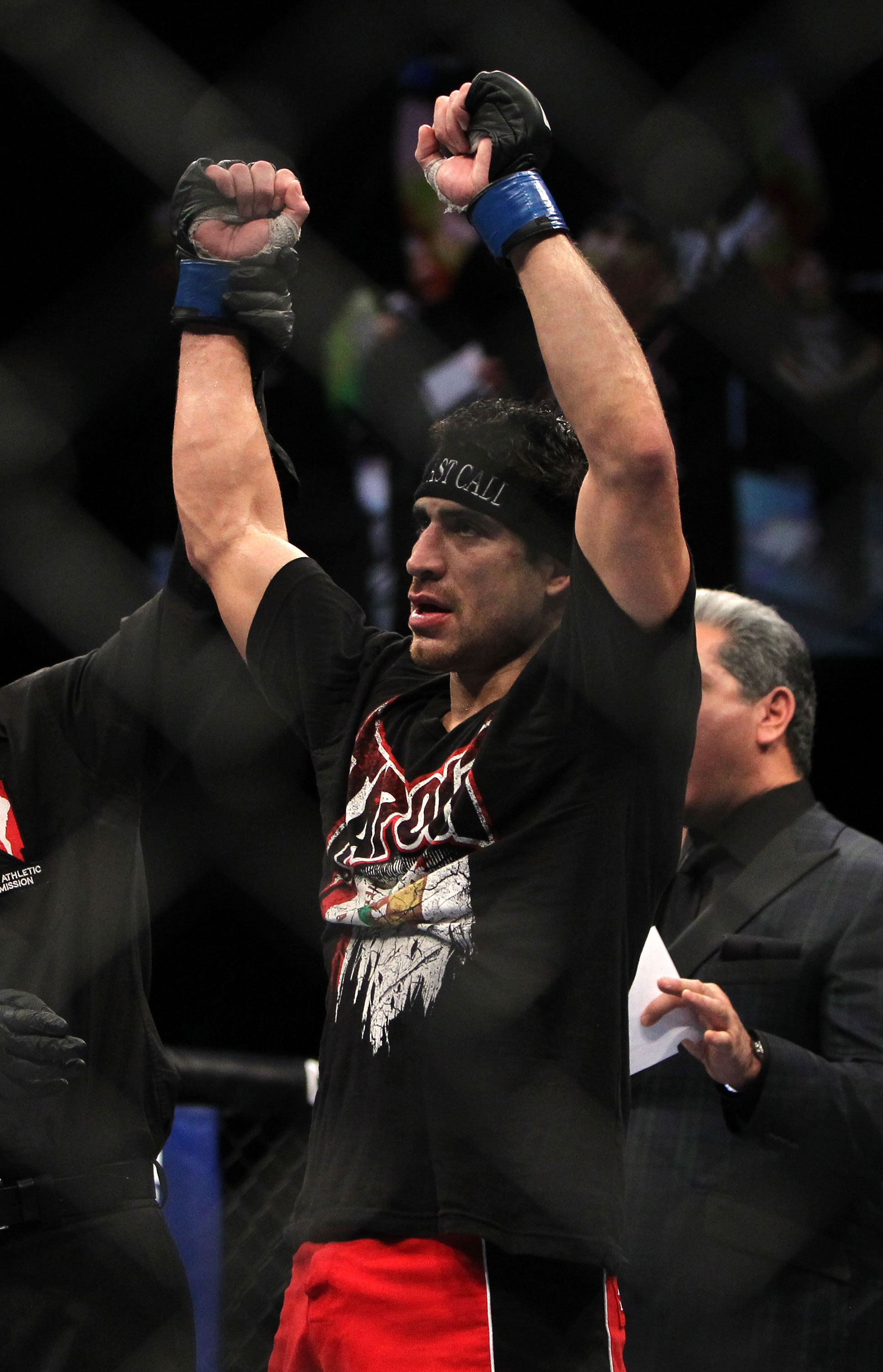 LAS VEGAS, NV - DECEMBER 30: Danny Castillo is declared the winner in his fight against Anthony Njokuani during the UFC 141 event at the MGM Grand Garden Arena on December 30, 2011 in Las Vegas, Nevada. (Photo by Josh Hedges/Zuffa LLC/Zuffa LLC via Getty Images) *** Local Caption *** Danny Castillo
