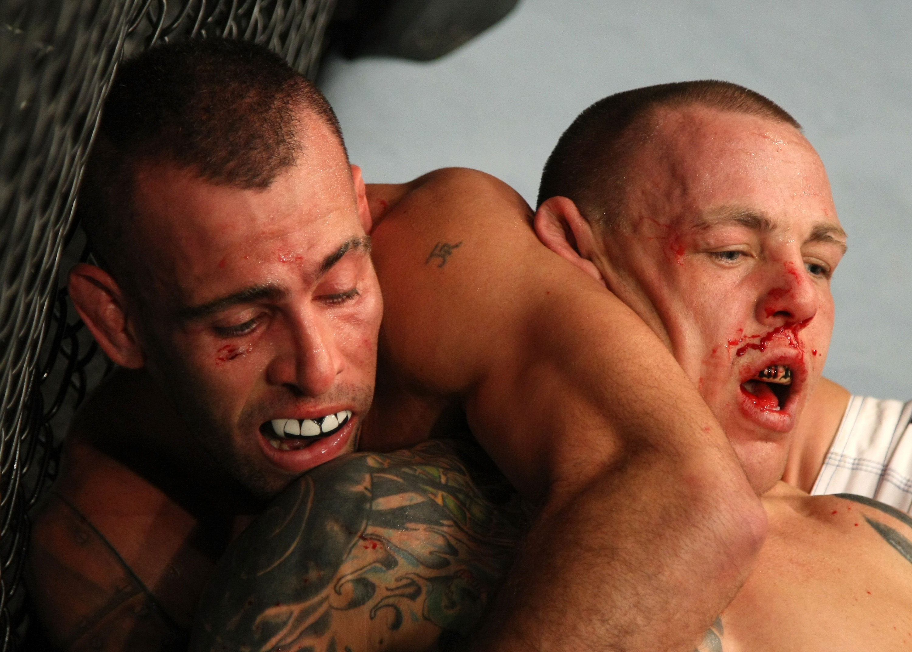 LAS VEGAS, NV - DECEMBER 30: Junior Assuncao (left) and Ross Pearson (right) grapple for position during the UFC 141 event at the MGM Grand Garden Arena on December 30, 2011 in Las Vegas, Nevada. (Photo by Donald Miralle/Zuffa LLC/Zuffa LLC via Getty Images) *** Local Caption *** Junior Assuncao; Ross Pearson
