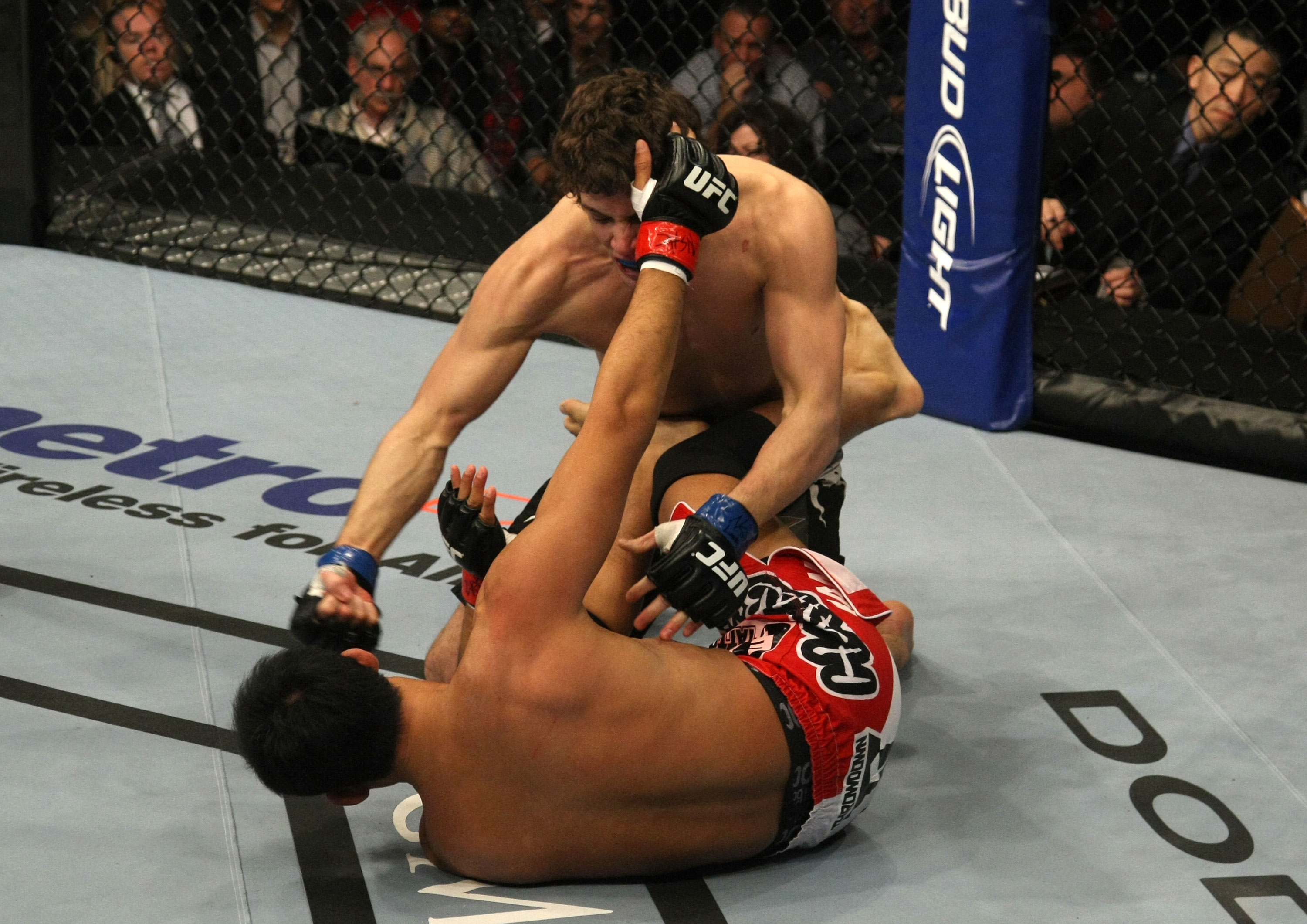 LAS VEGAS, NV - DECEMBER 30: Jimy Hettes (top) punches Nam Phan during the UFC 141 event at the MGM Grand Garden Arena on December 30, 2011 in Las Vegas, Nevada. (Photo by Donald Miralle/Zuffa LLC/Zuffa LLC via Getty Images) *** Local Caption *** Jimy Hettes; Nam Phan