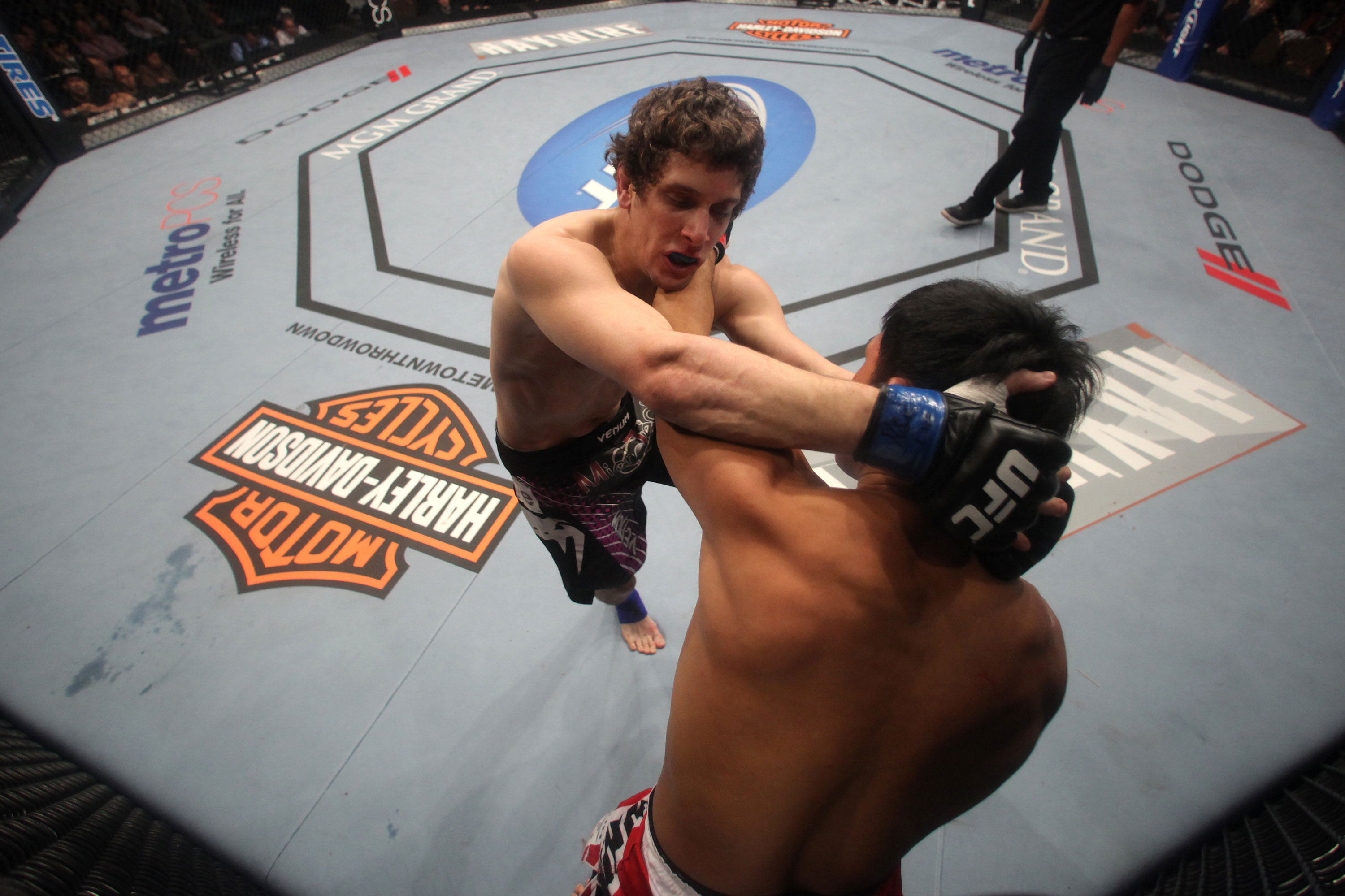 LAS VEGAS, NV - DECEMBER 30: Jimy Hettes (left) and Nam Phan grapple for position during the UFC 141 event at the MGM Grand Garden Arena on December 30, 2011 in Las Vegas, Nevada. (Photo by Donald Miralle/Zuffa LLC/Zuffa LLC via Getty Images) *** Local Caption *** Jimy Hettes; Nam Phan